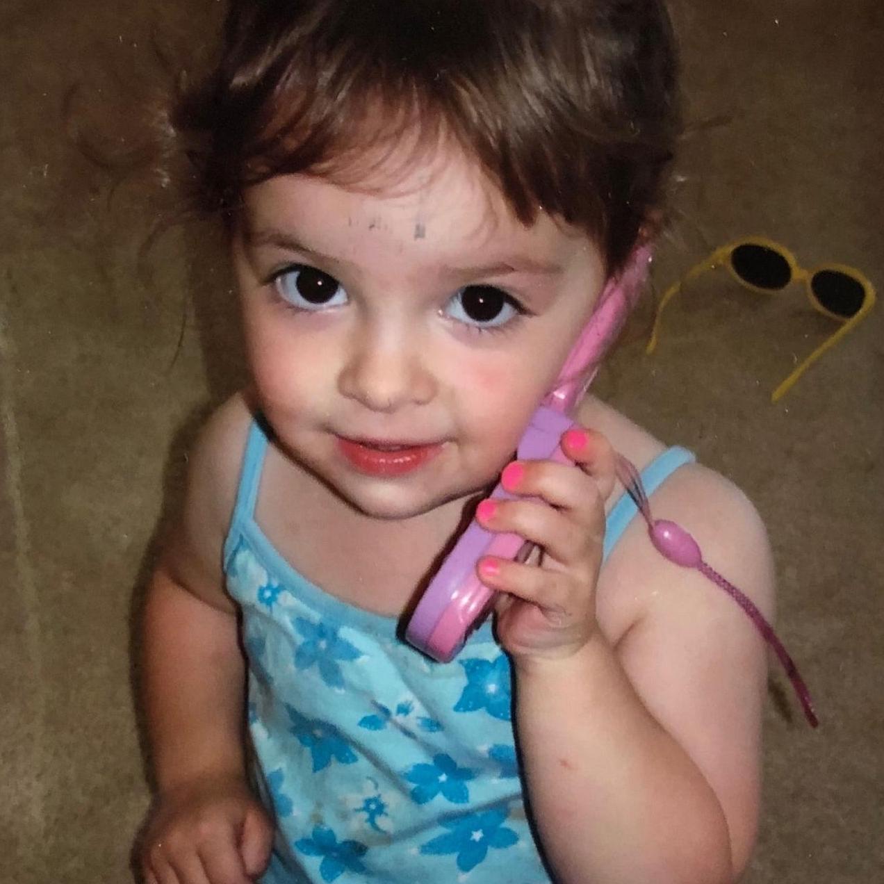 Emma taking important phone calls.