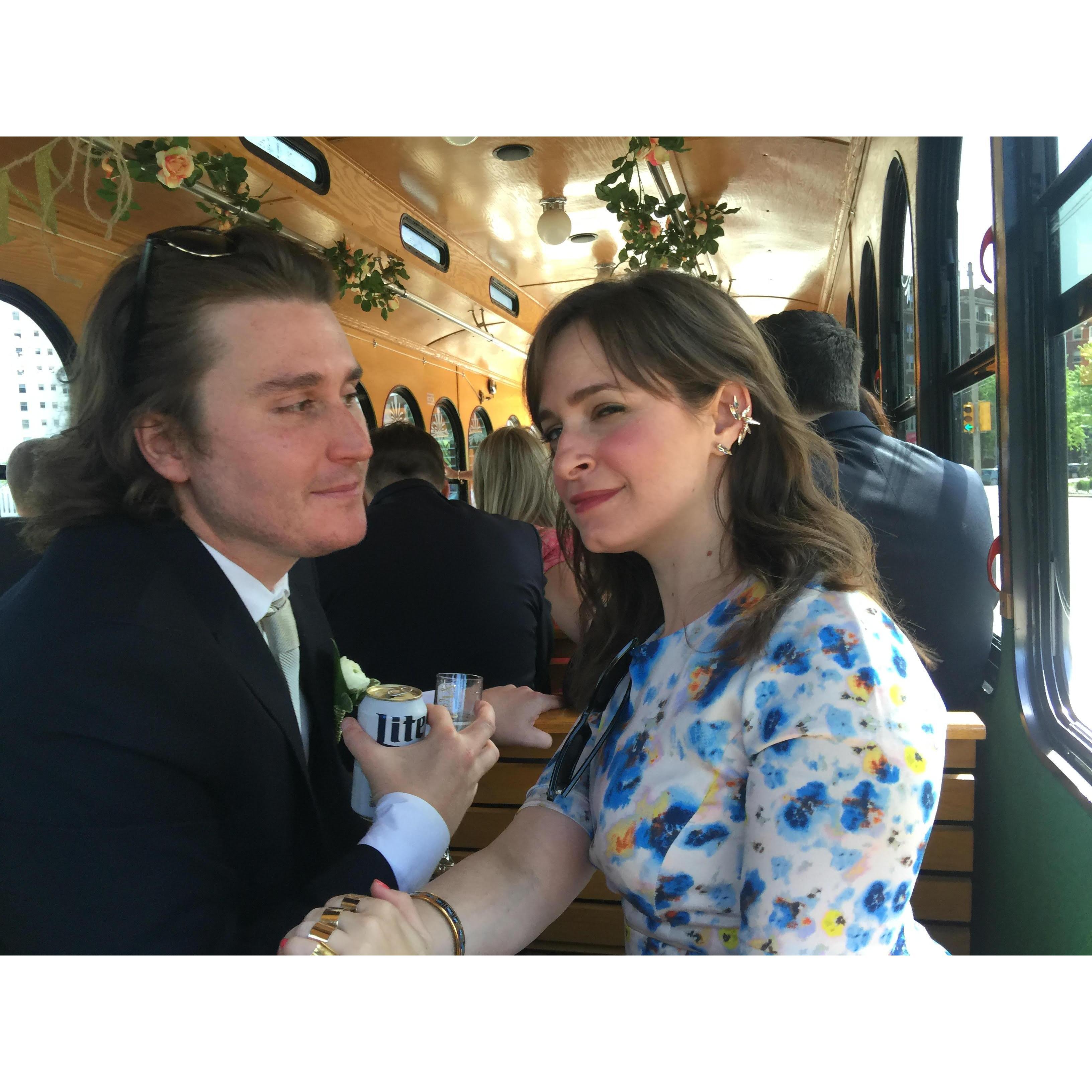Jessica and Steve on a trolley. Steve is drinking Miller Lite. In Wisconsin.