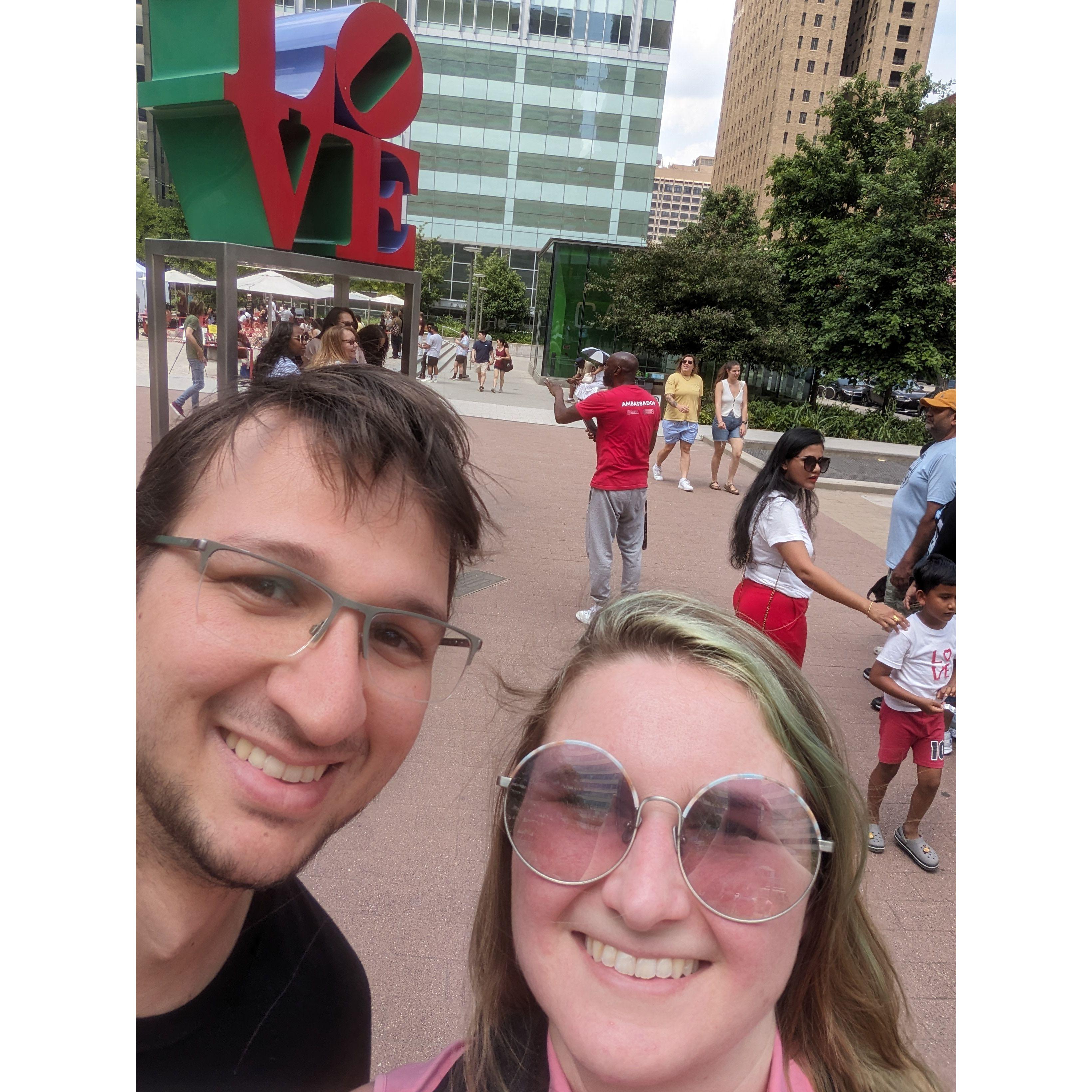 Standing near a monument to love in the city inspired by it.