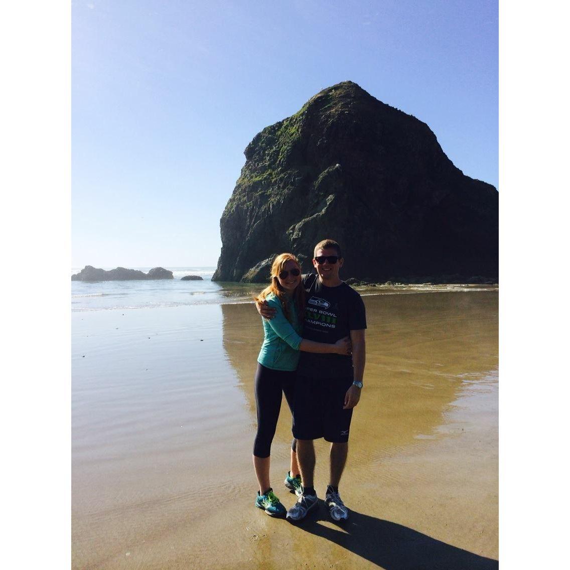 We love going on trips here we are at Cannon Beach in Oregon while in college.