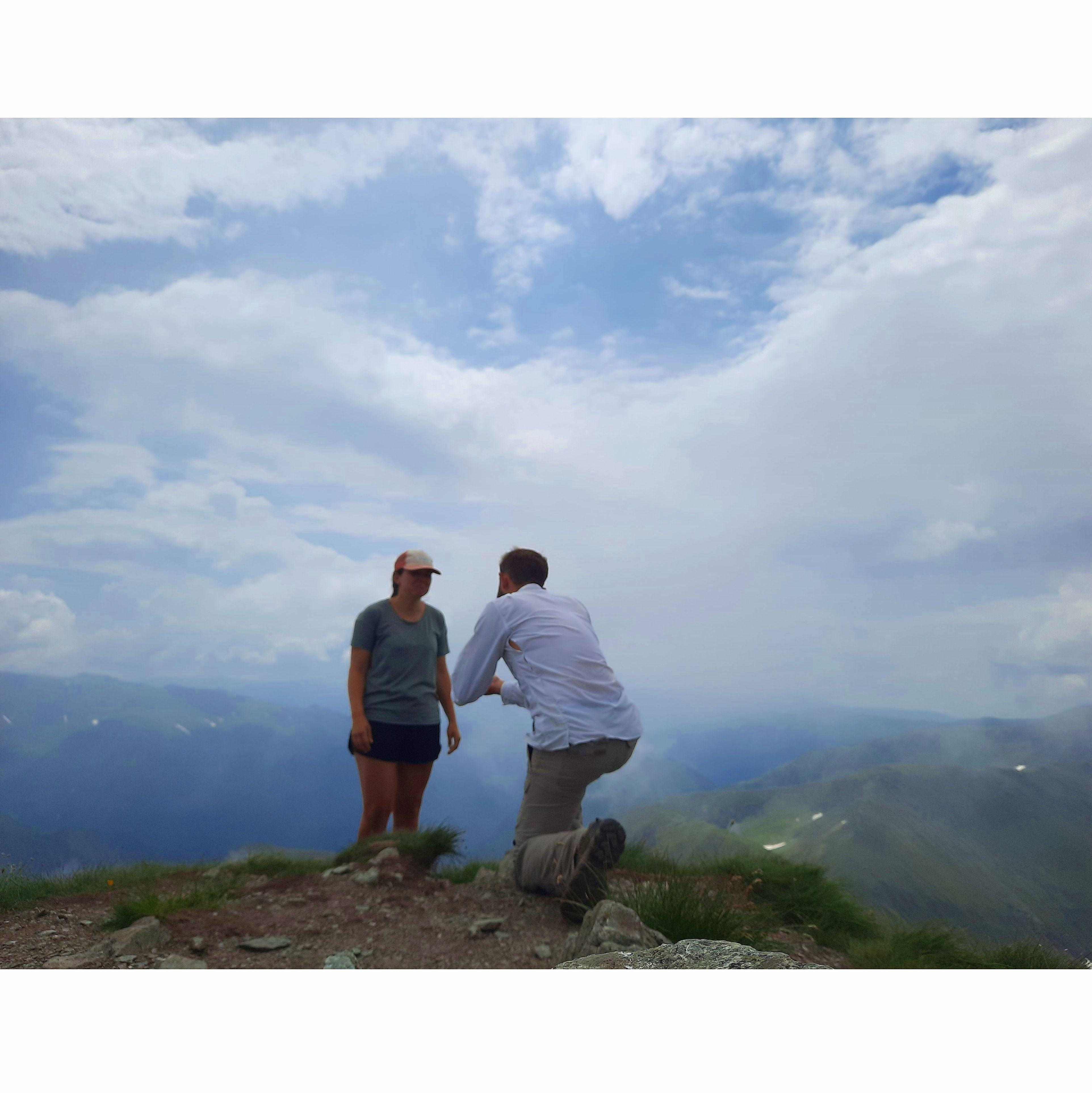 Nick down on one knee on top of Romania’s highest peak, Mt. Moldoveanu (July 2022)