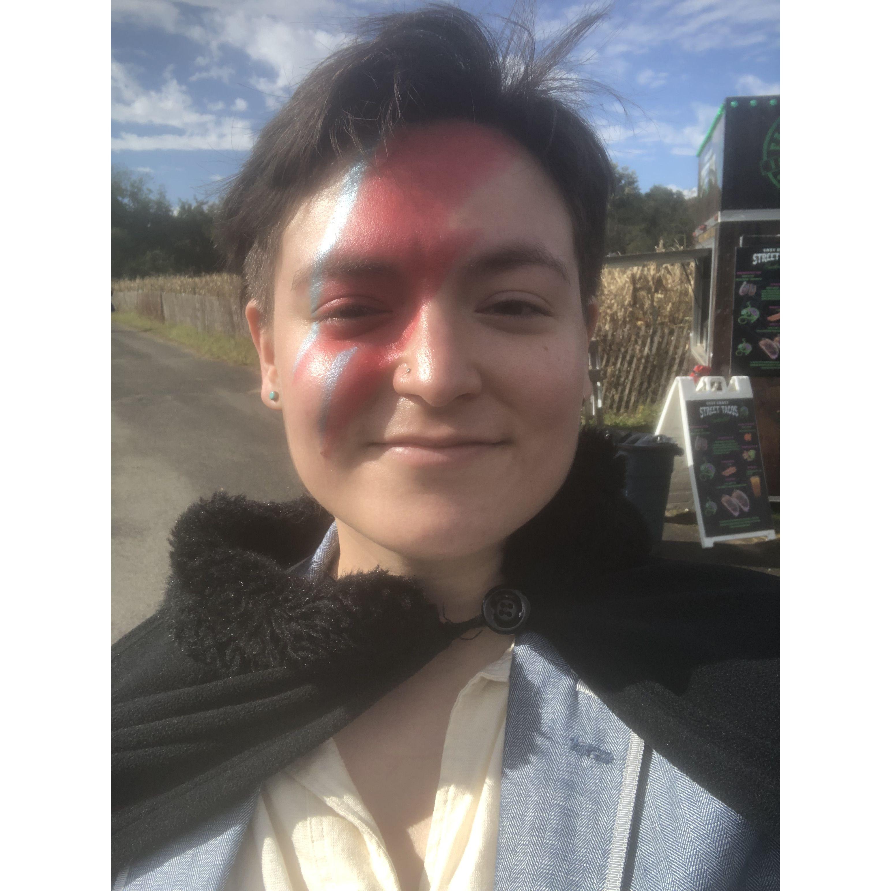 Miles did Amy's makeup to be David Bowie for a trip to the Queens County Farm Museum