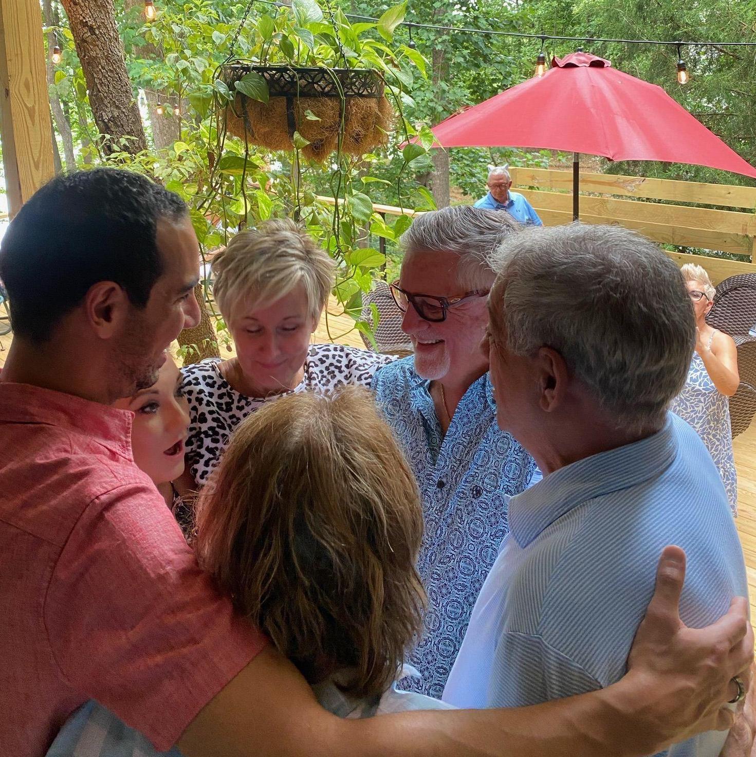 Our families meet for the first time and celebrate together at Charlie's "We found your dad" party.