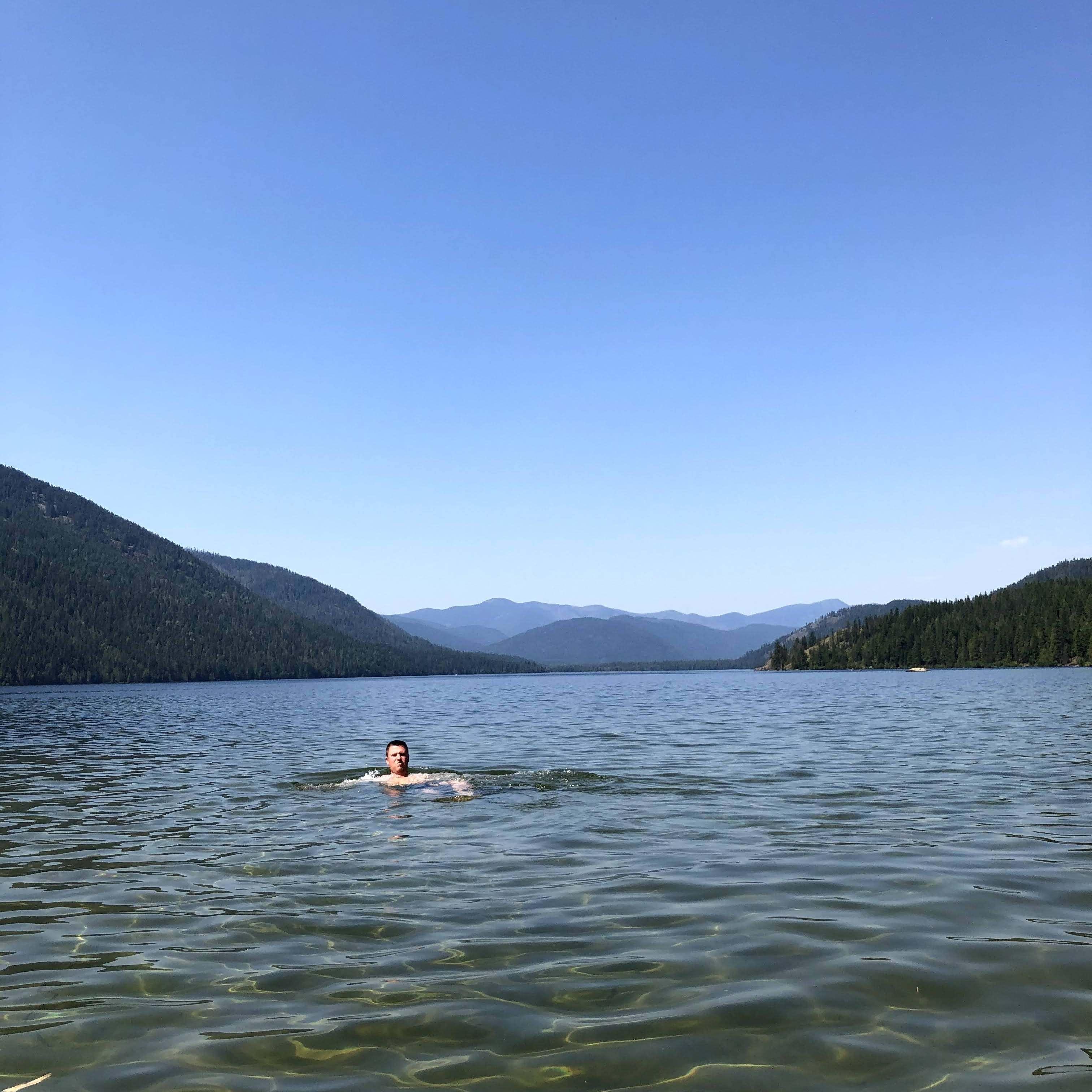 Mark swimming in Priest Lake, ID. 2020.