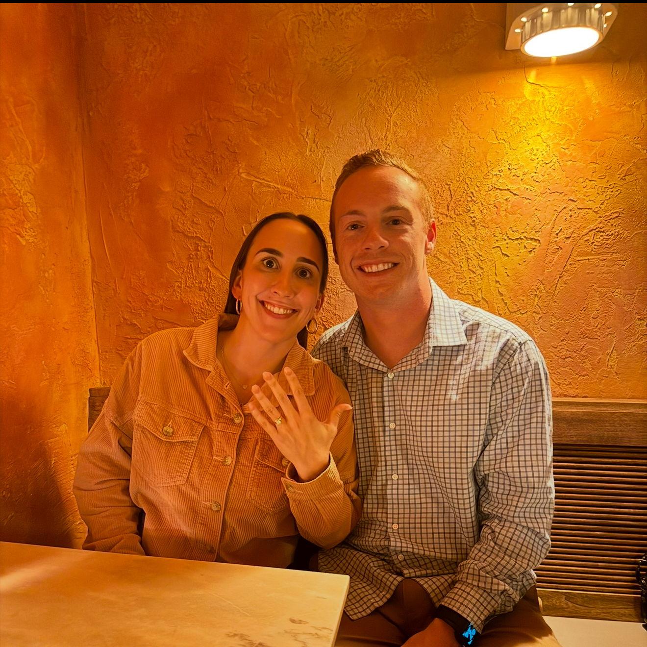 The night Steve proposed! Don't mind the shirt Claire has had for 6 years, the non-painted finger nails, and the huge zit on her face. Thanks a lot Steve.......