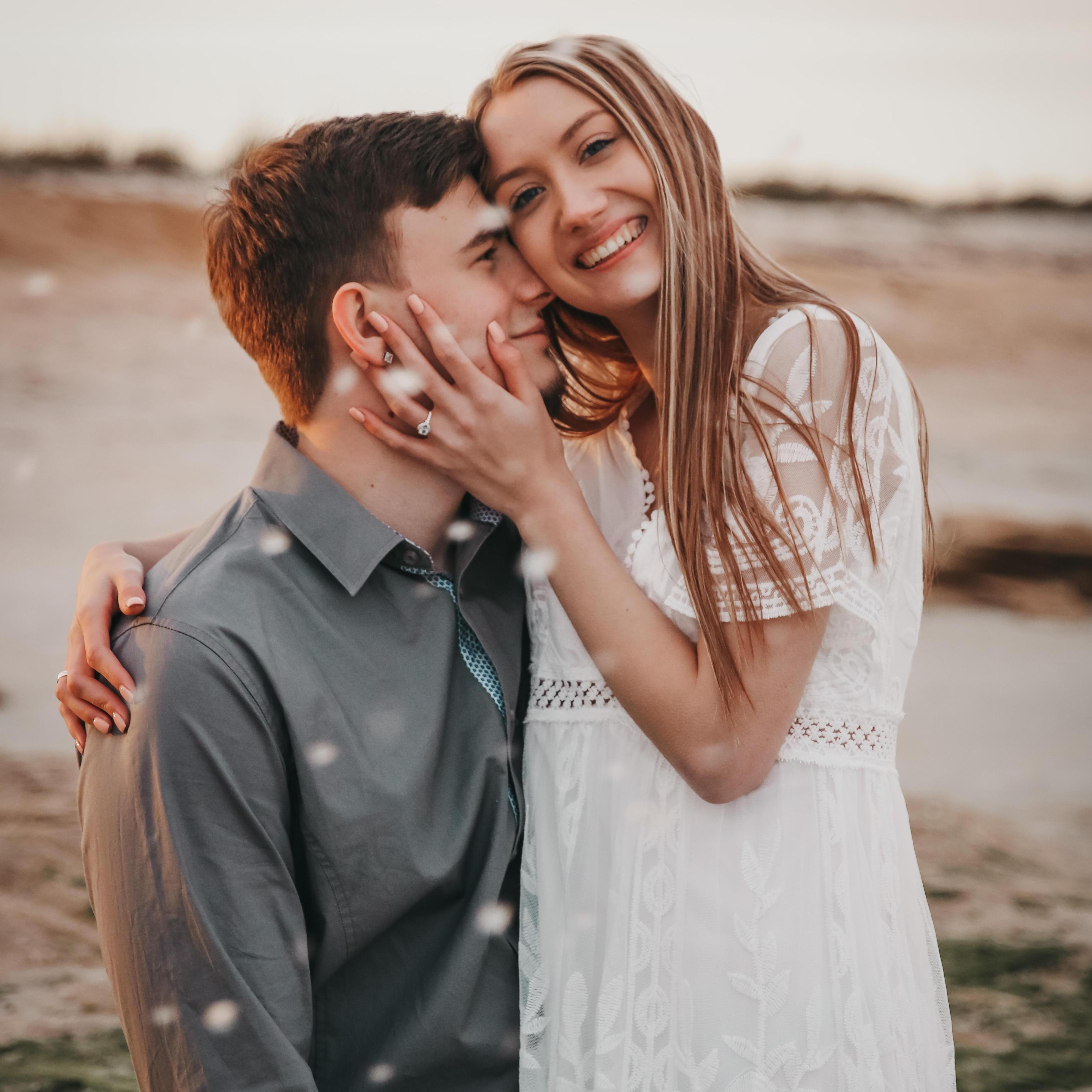 The water droplets you see in this picture are actually from a water bottle ha! Makala Beckworth took our engagement pictures. Water was flung everywhere! So fun
