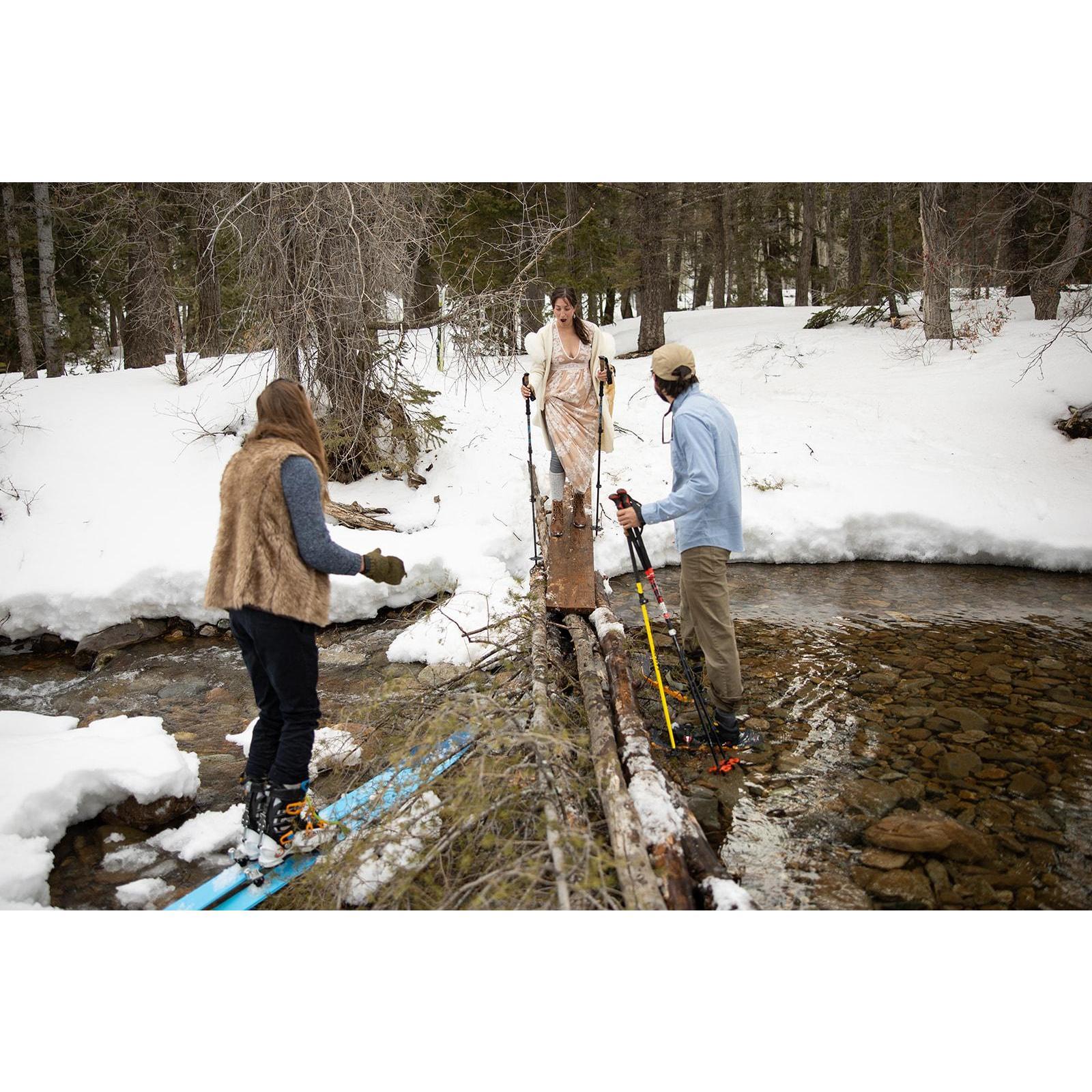 Crossing the bridge that the boys made to get to the ceremony site after realizing that the bridge that was there in the morning had collapsed.