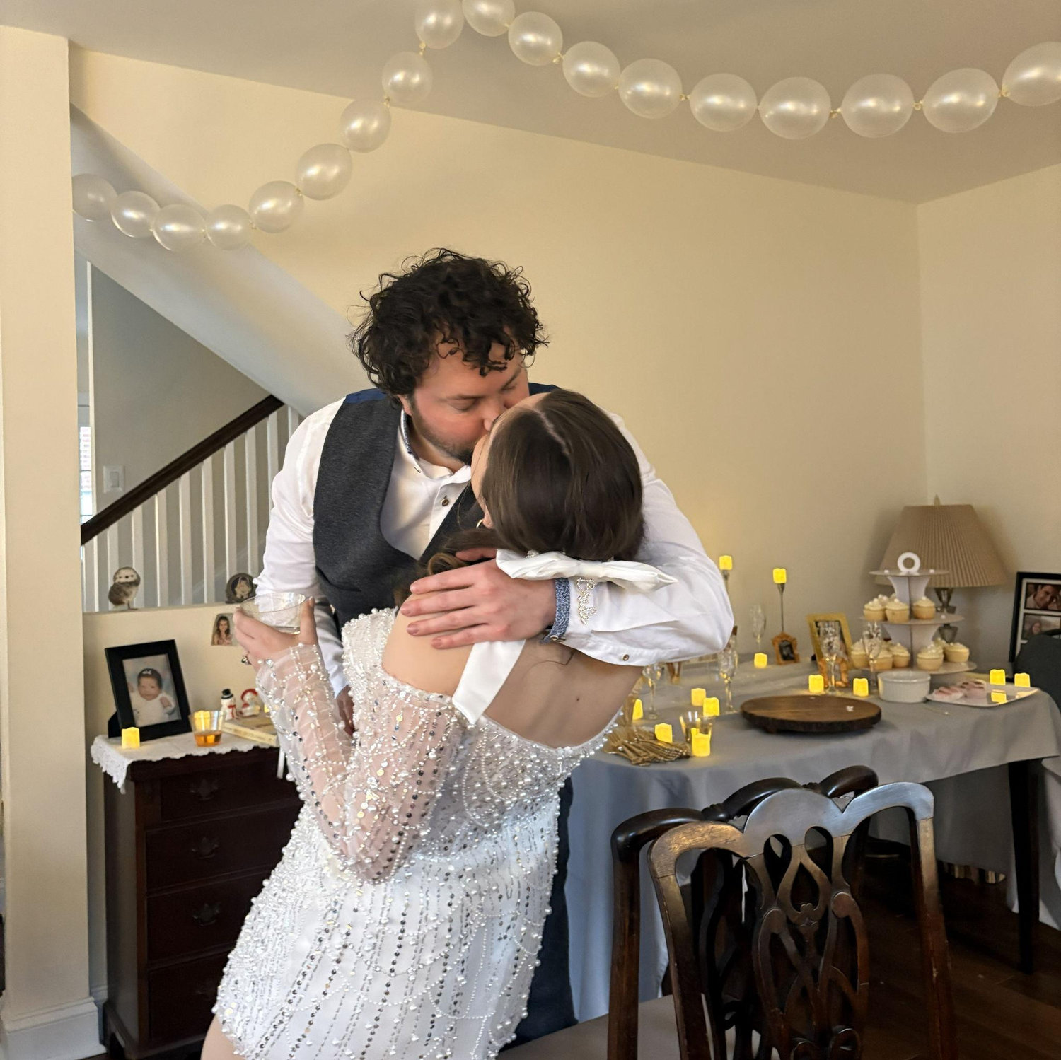 Michael sweeping Grace off her feet at her Bridal Shower