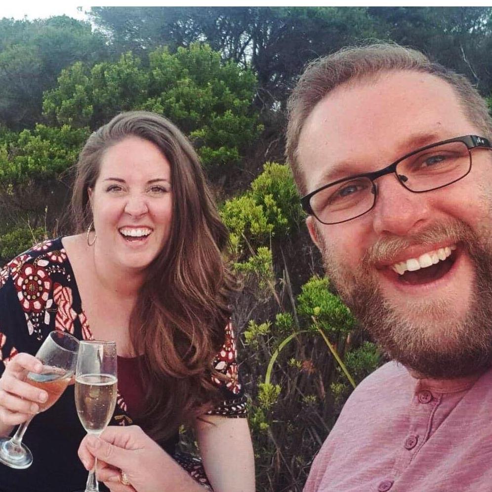 Drinking champagne by the ocean near Melbourne.