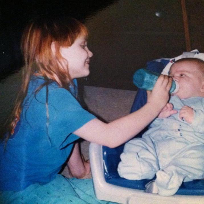 Charlie’s sister (Reba Ratliff) and Charlie as a baby