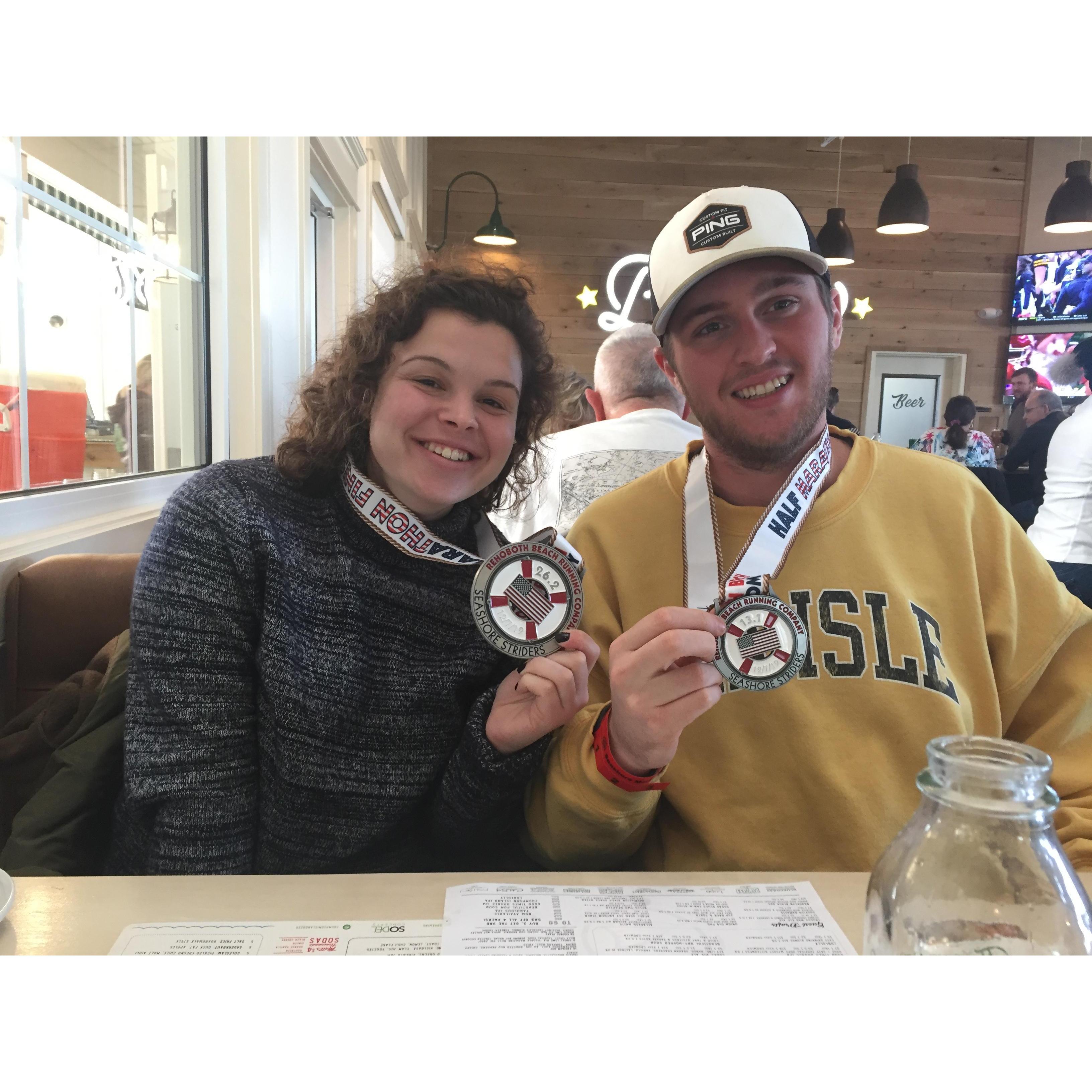 In Rehobeth Delaware, after Matt finished his first half marathon and Anna finished her second full marathon. Don't let the smiles fool you, we were both hangry here waiting for our food.