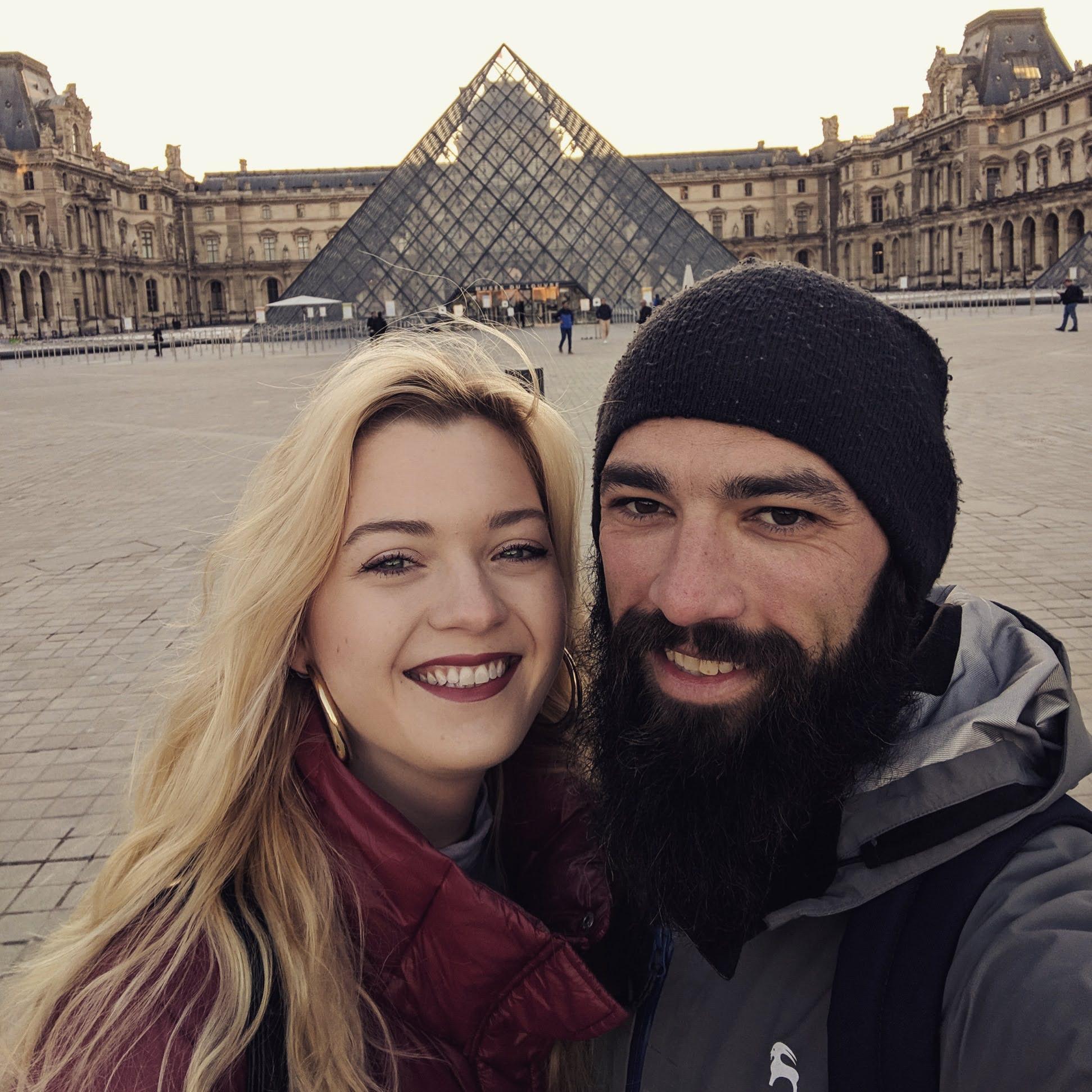 Visiting the Louvre in Paris. The couple spent 4 weeks traveling through Europe together in February of 2019.