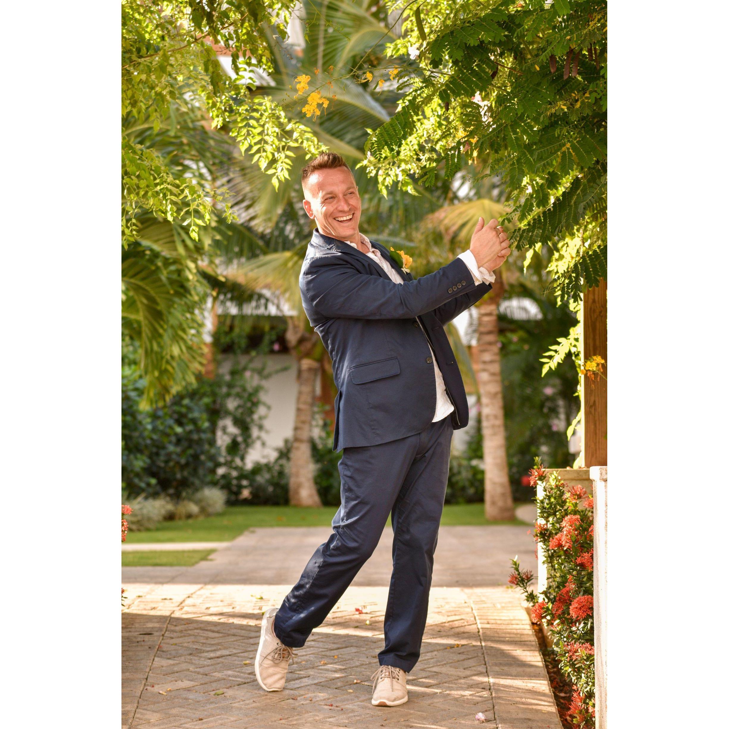 The photographer said "act natural", so of course he practiced his golf swing