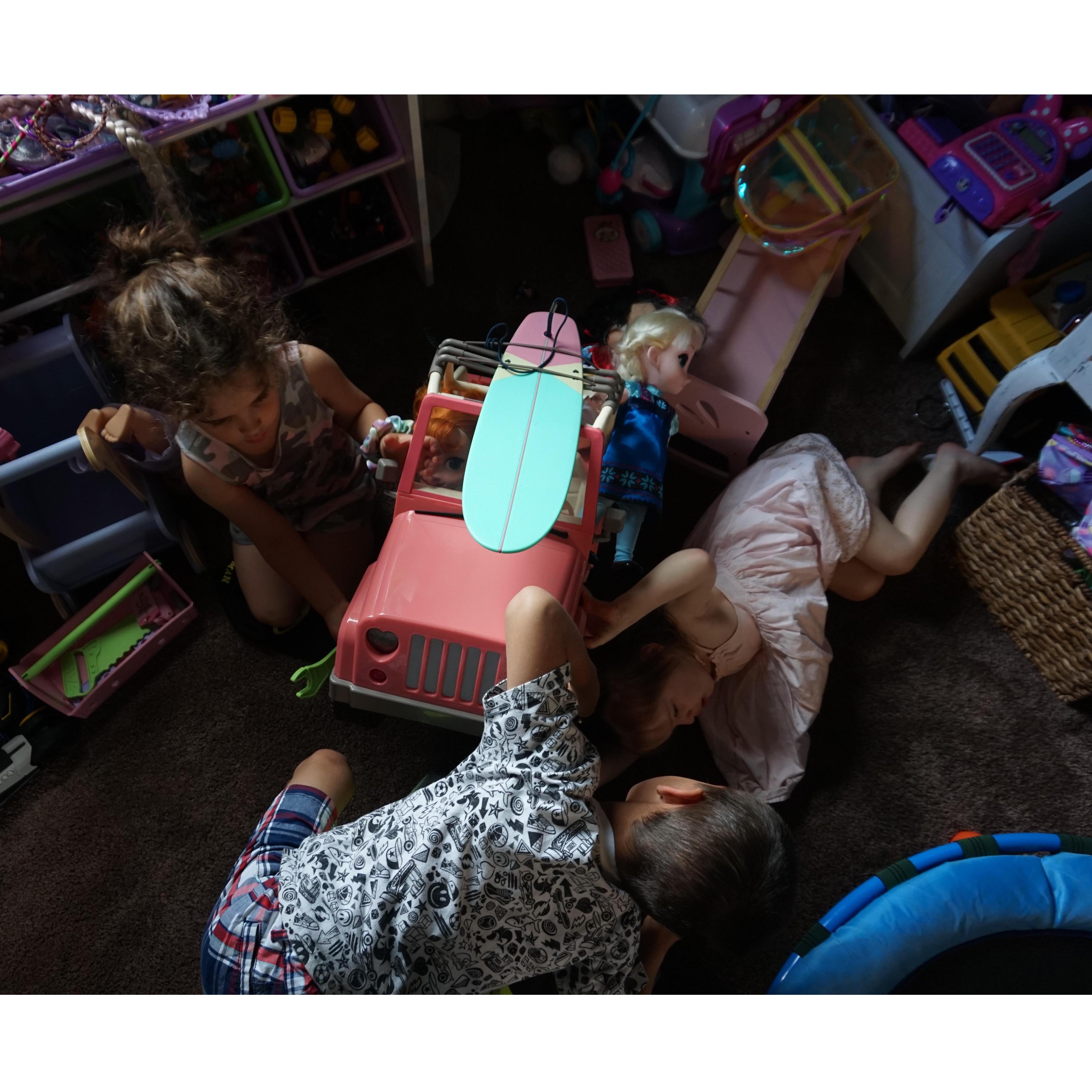 It looks like they've been watching their Poppa work in the garage!