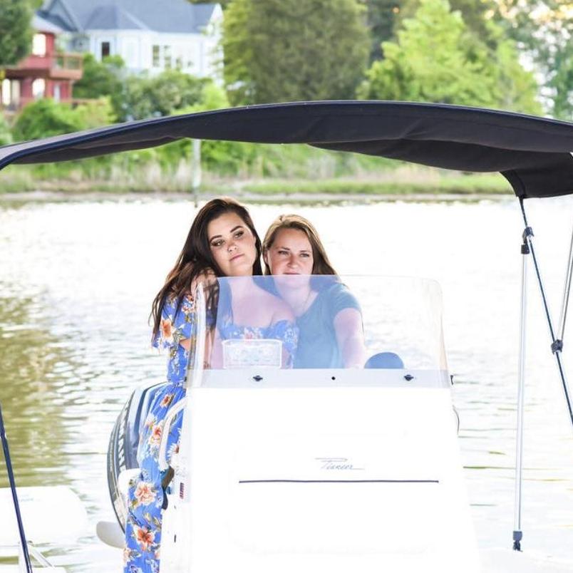 Jaclyn said, "Let me drive the boat."