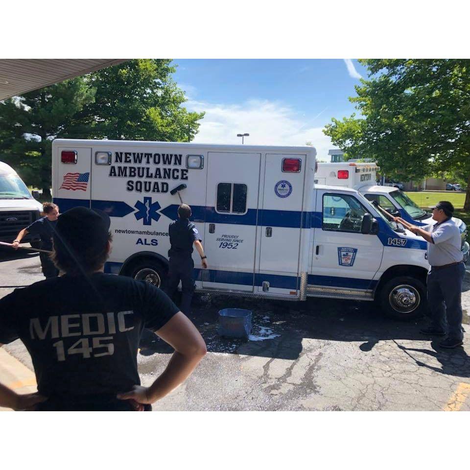 Washing the ambulance the day we met. July 15, 2018