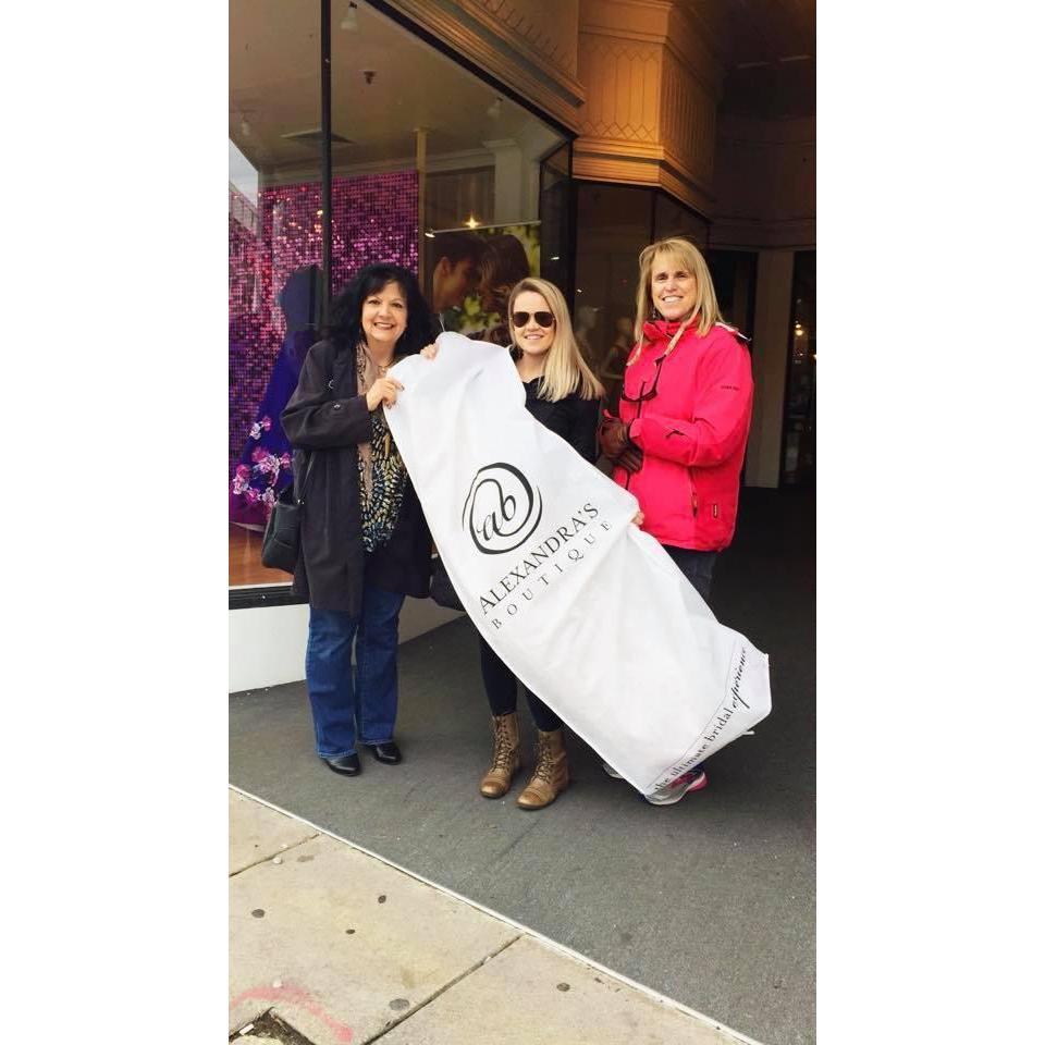 The day I picked up my dress with my mom and future Mother-in-Law!