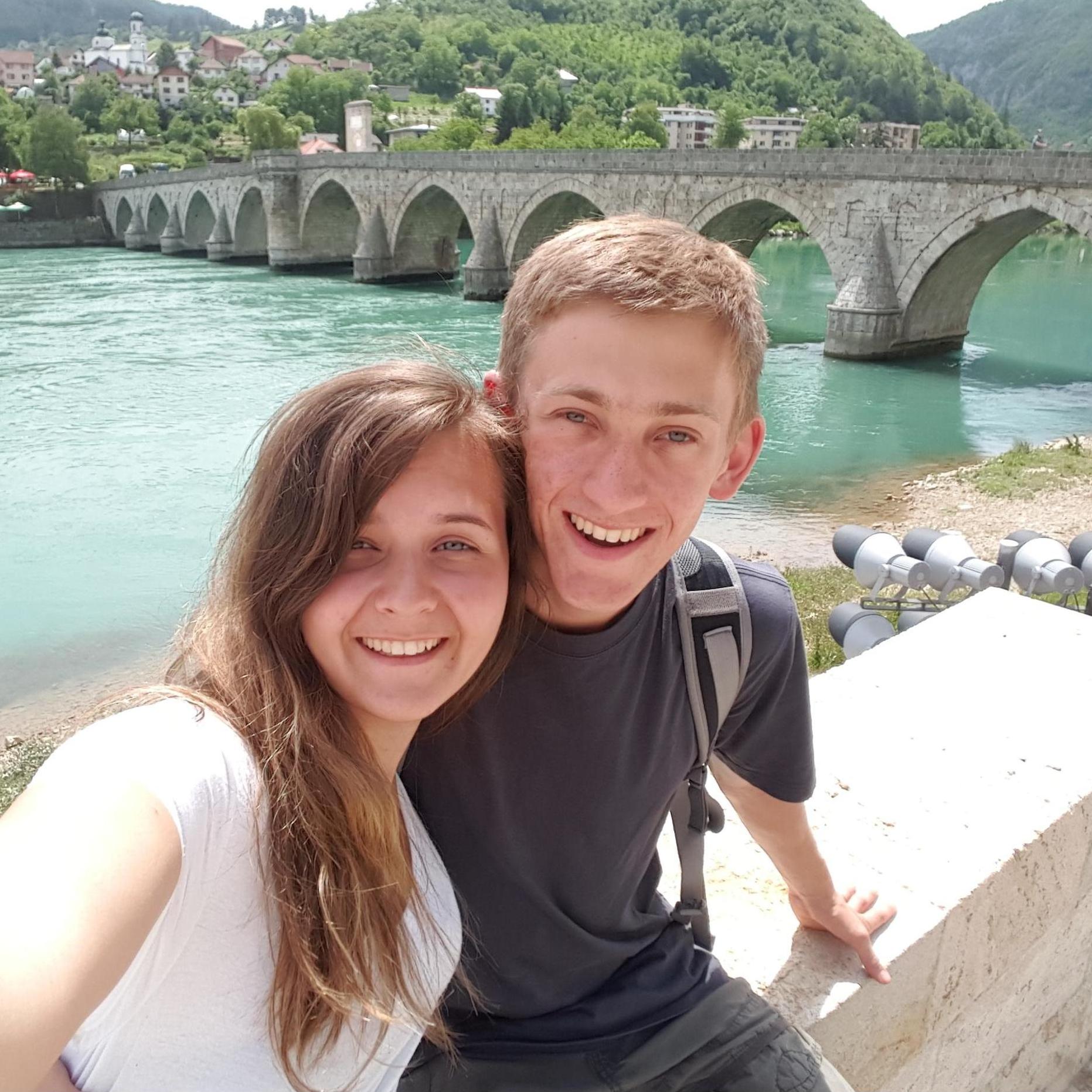 Both of us participated in the East Meets West Honors program at Houghton College! Here, we are standing on a hill, overlooking the bridge on the Drina River.
