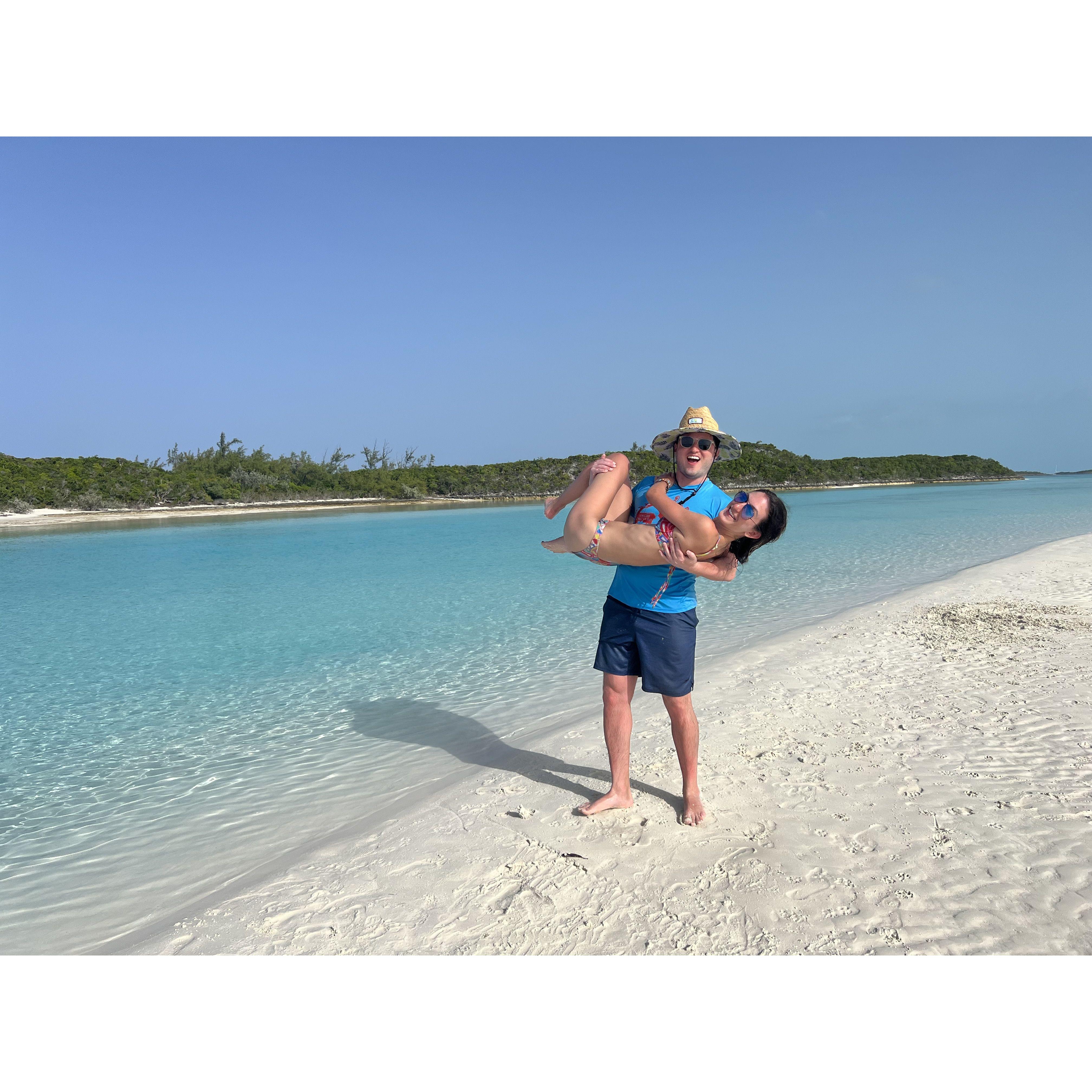 Anuar dragging Sofia out of the water