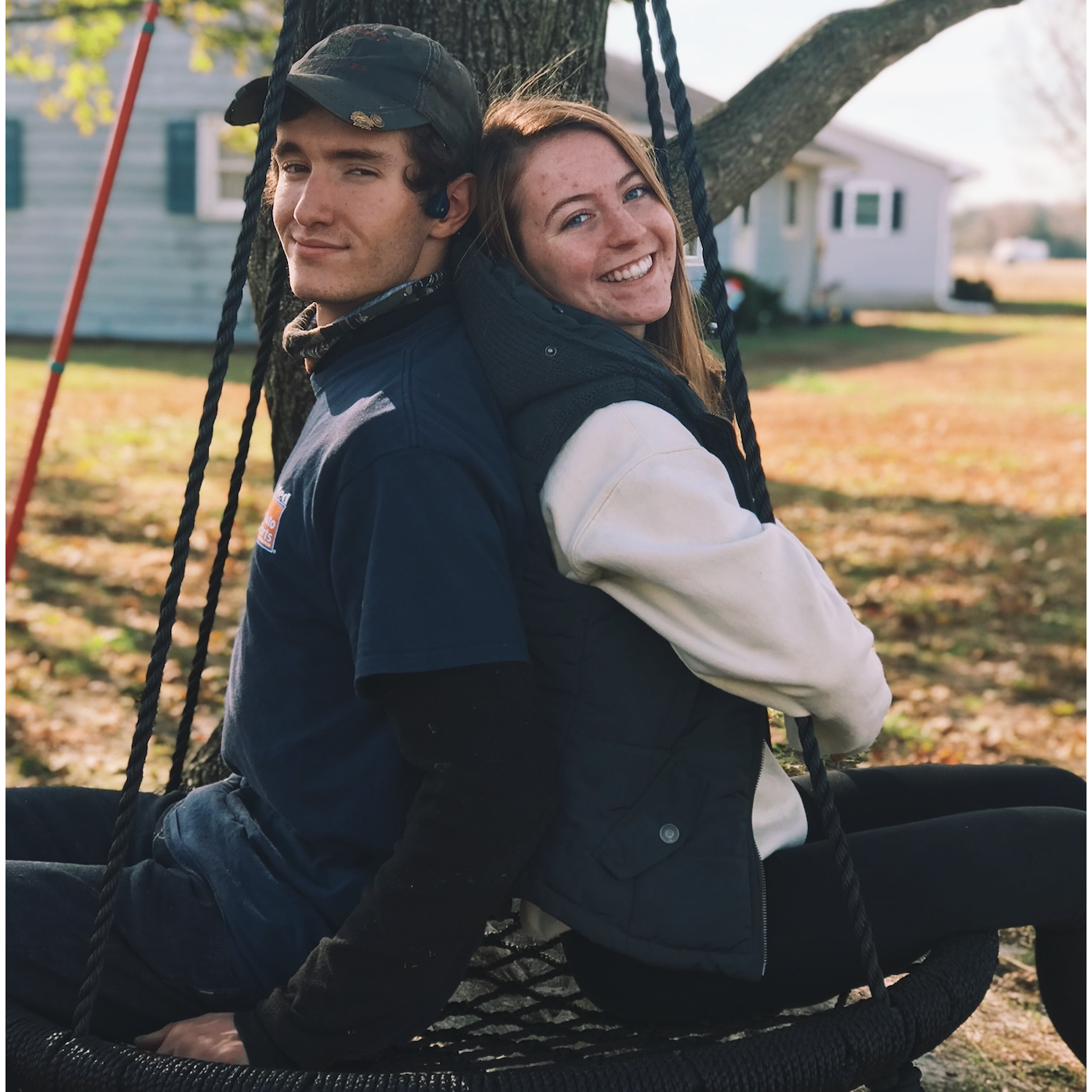 Casual photo of the two of us, our future first home in the background (but we didn't know that yet!)