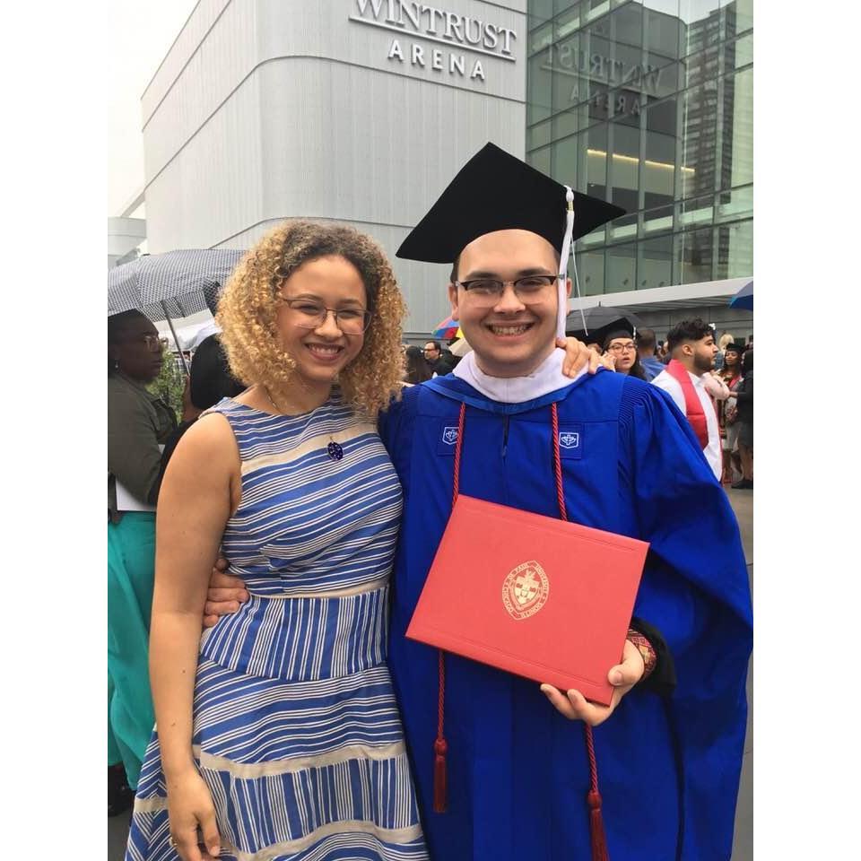 Julian celebrates receiving his Master's degree in International Studies!
