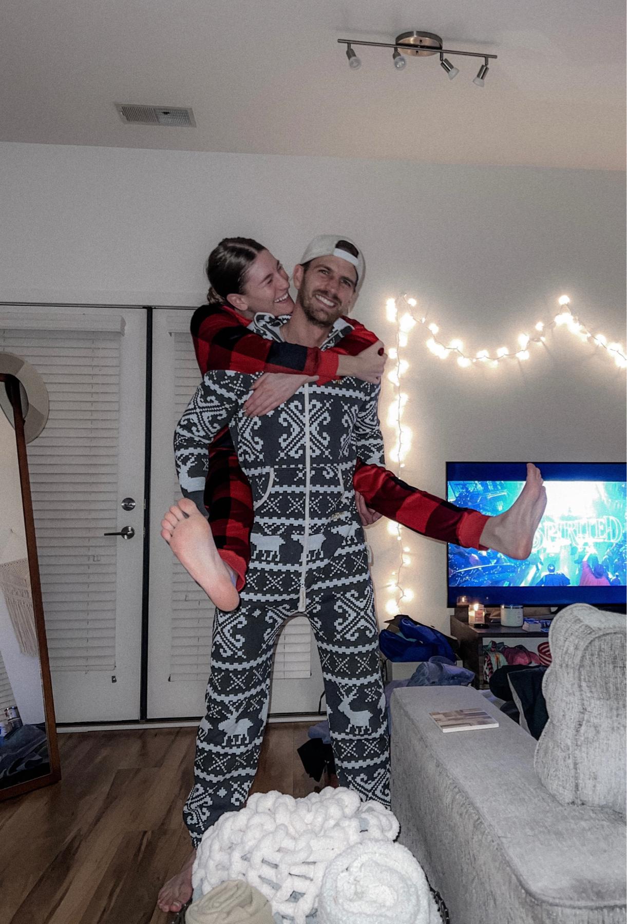 Christmas movies in our Christmas onesies