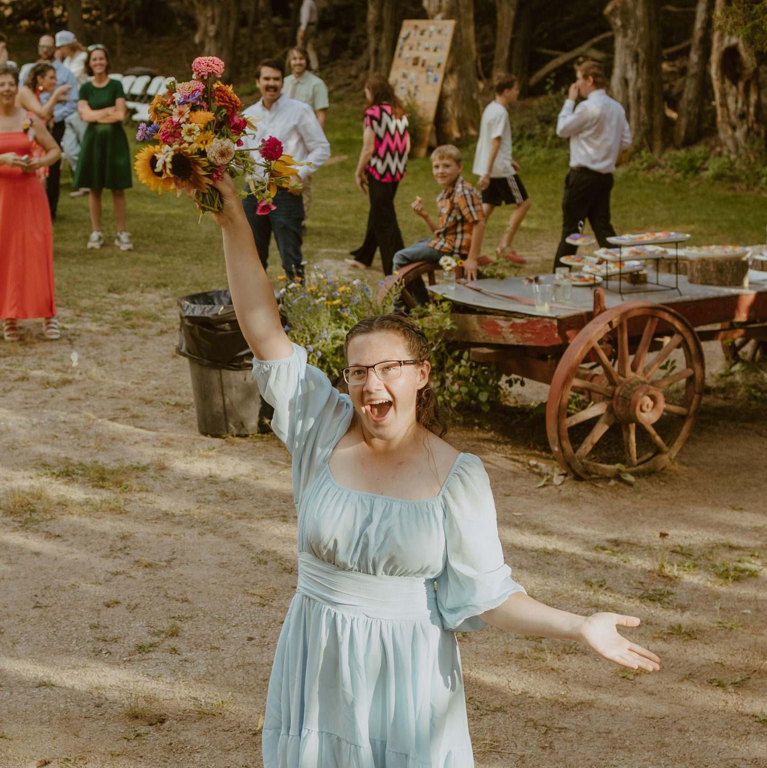 Laini catching the bouquet at Linzi's wedding last August.