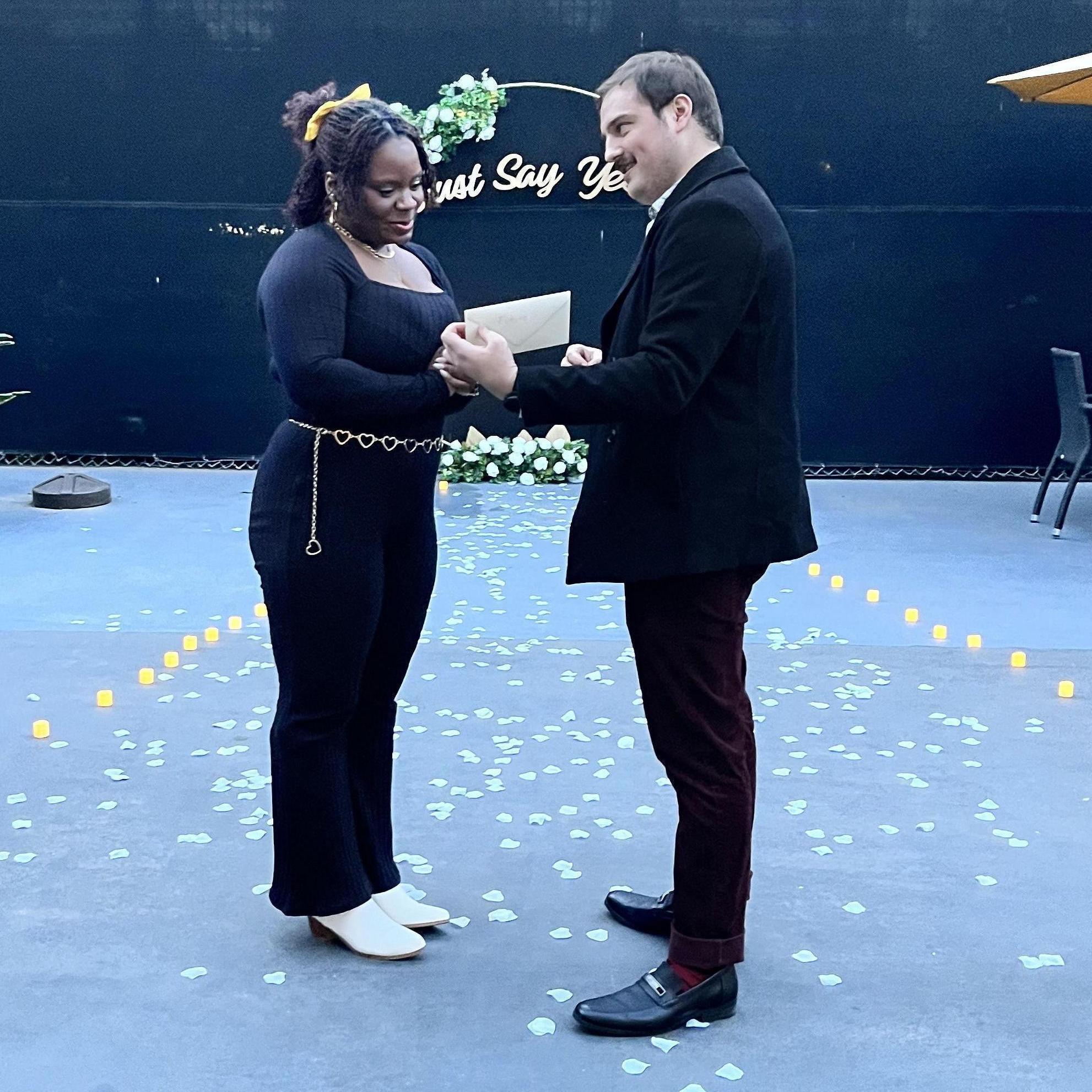 Maid of honor Roberth-Ann and best man Brandon create a dreamy atmosphere for the engagement