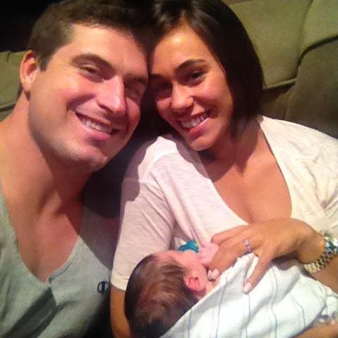Holding our new niece (AMC's goddaughter), Skylar Taack, for the first time, October 2014.