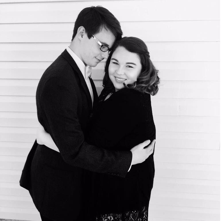 This picture was taken before our first college banquet. I love the way he looks at me!