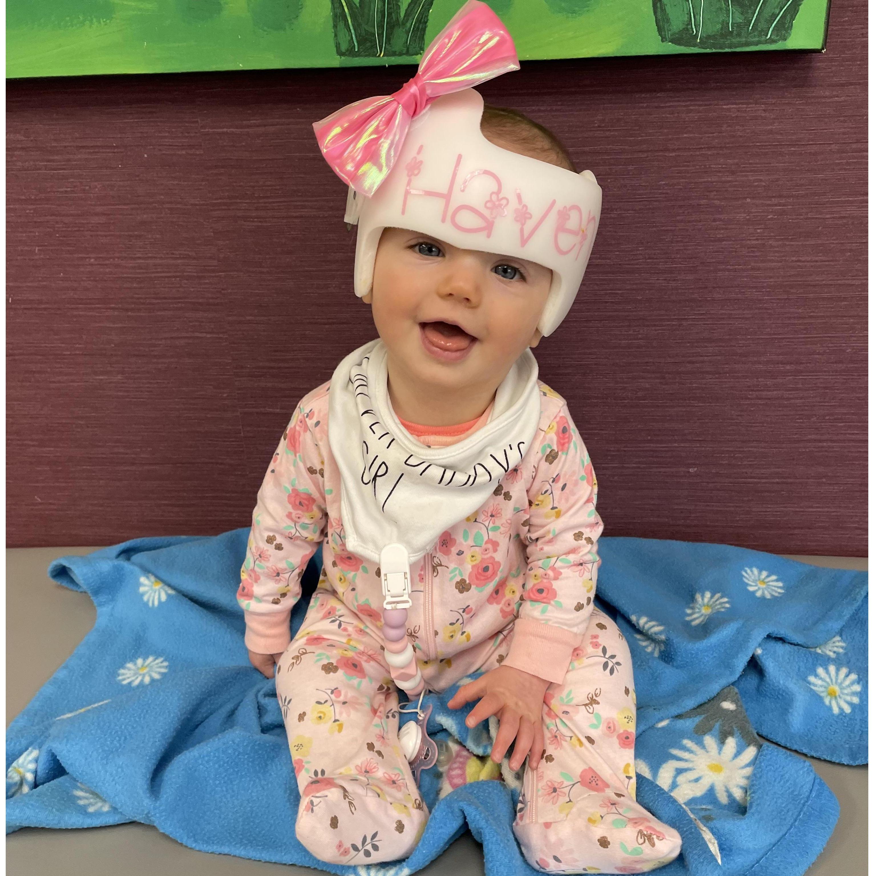 Sweet baby girl at her bi-monthly helmet fitting.