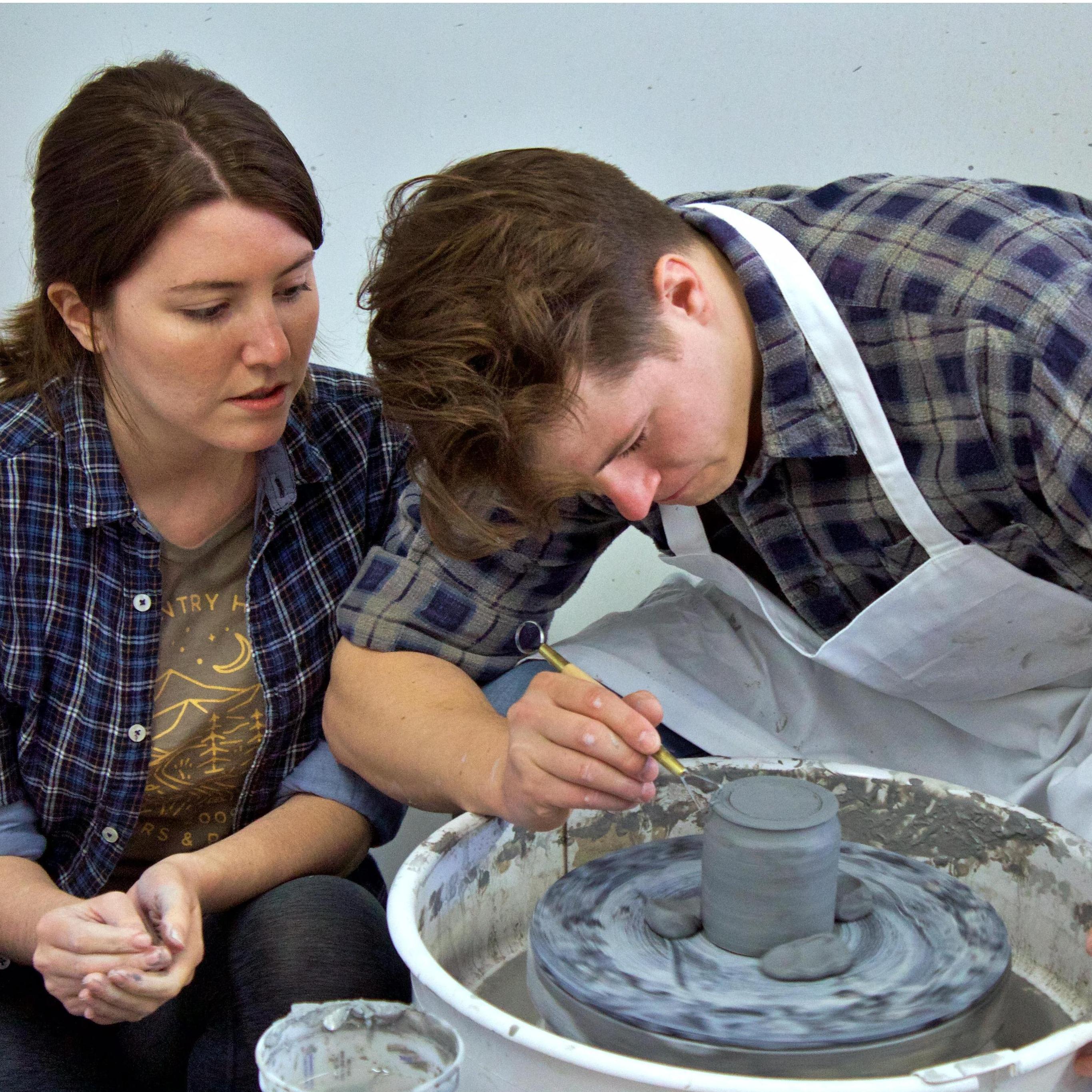 John learning ceramics!