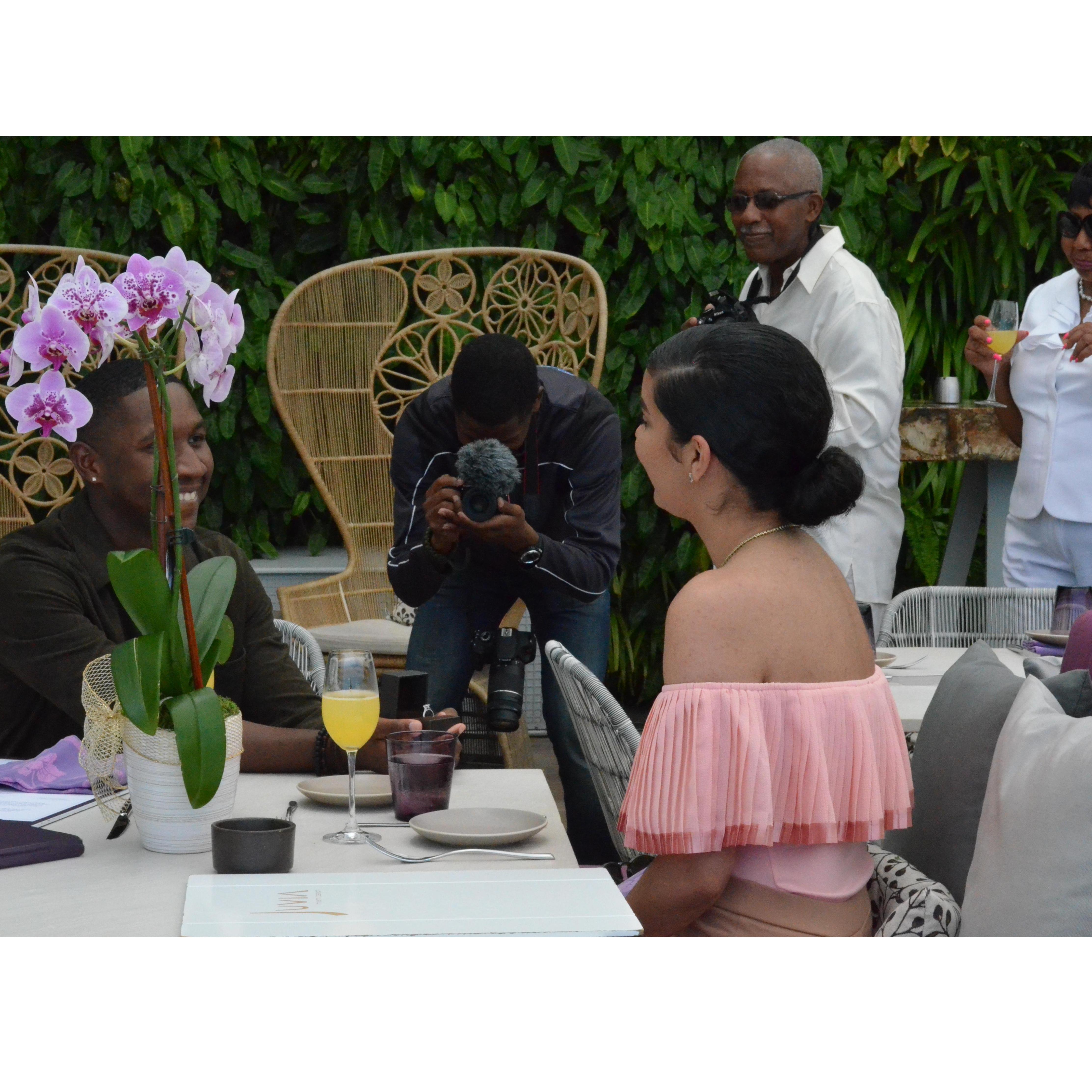 ... no way! Joshua's family is here! Uncle Frank and Joshua's mother could barely contain their excitement and wanted to get a closer view of the proposal for themselves!