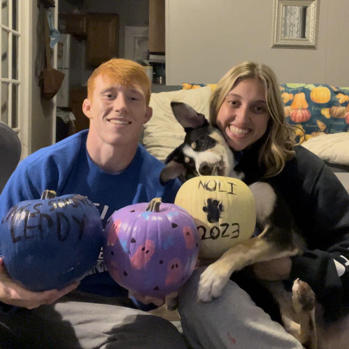 Family Pic! Noli gets his own pumpkin.