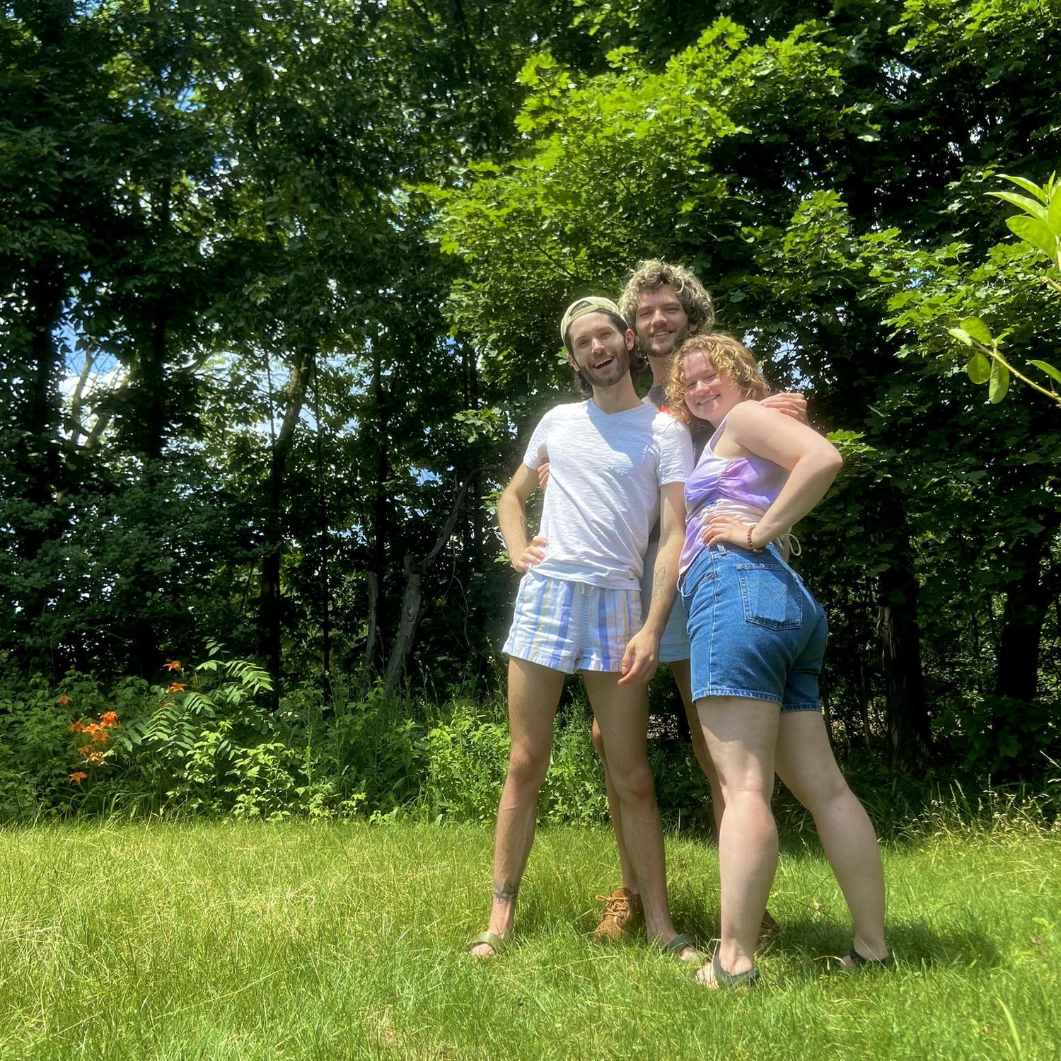 The couple & Alyssa in the backyard, 
July 2023.