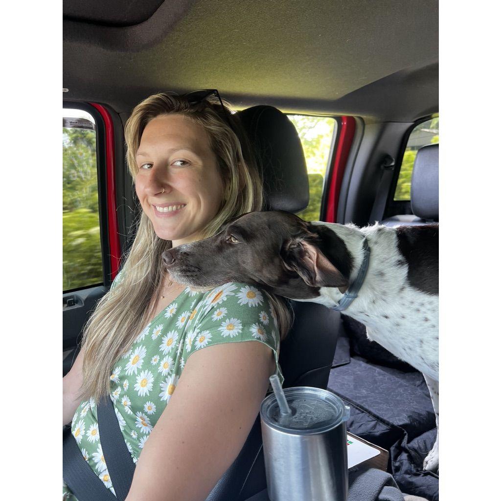 Maggie's first trip to the farm and got to be Nelli's chin rest