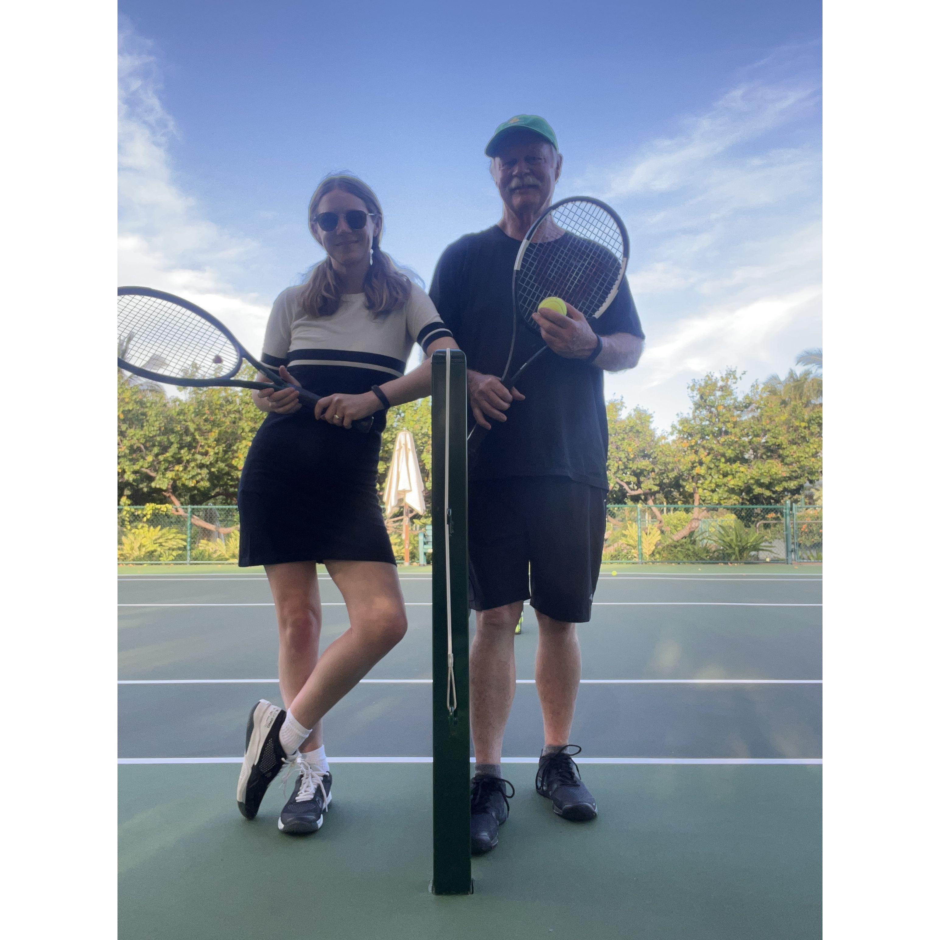 Nicole and her dad hitting some tennis balls in Hawaii