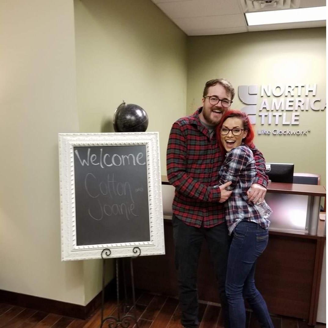 Signing the papers on our first home!