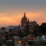 Enjoy a cocktail at sunset at the rooftop bar of the Rosewood Hotel