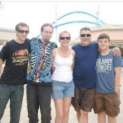 Sheila and her handsome men having fun at Cedar Point.