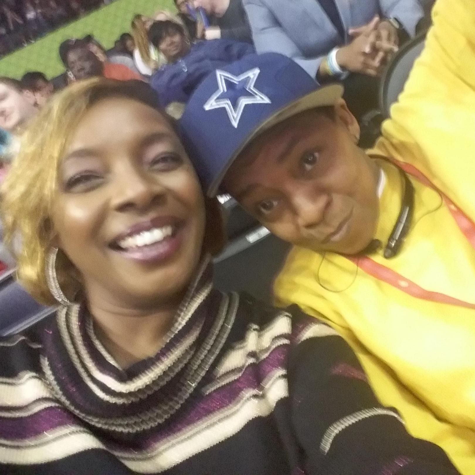 Nae and Me at the Hawks v OKC game celebrating with baby