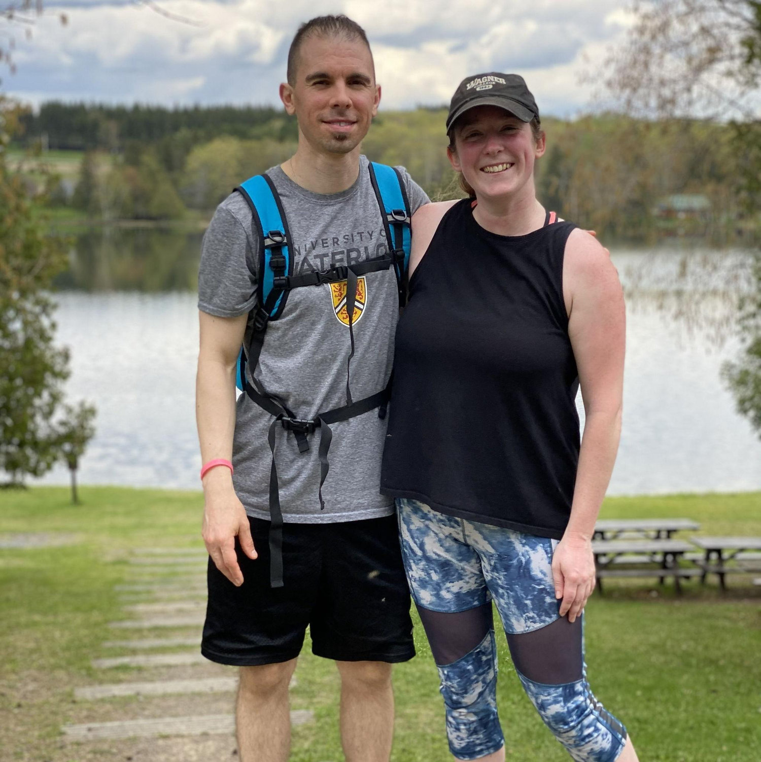 The couple's first unmasked picture! Ugh thanks COVID. Hiking in Maine with friends Mike and Chris.