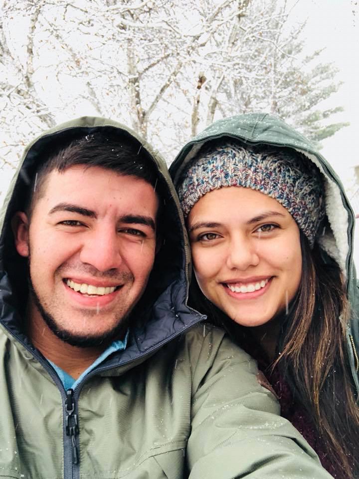 His first time seeing snow and our first road trip. Wisconsin.