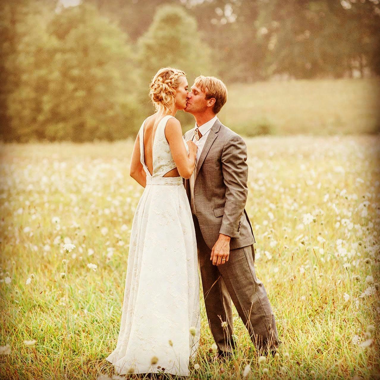 Moments after we surprised everyone in Ohio and got married! So glad Uncle Tom left the wild flowers!