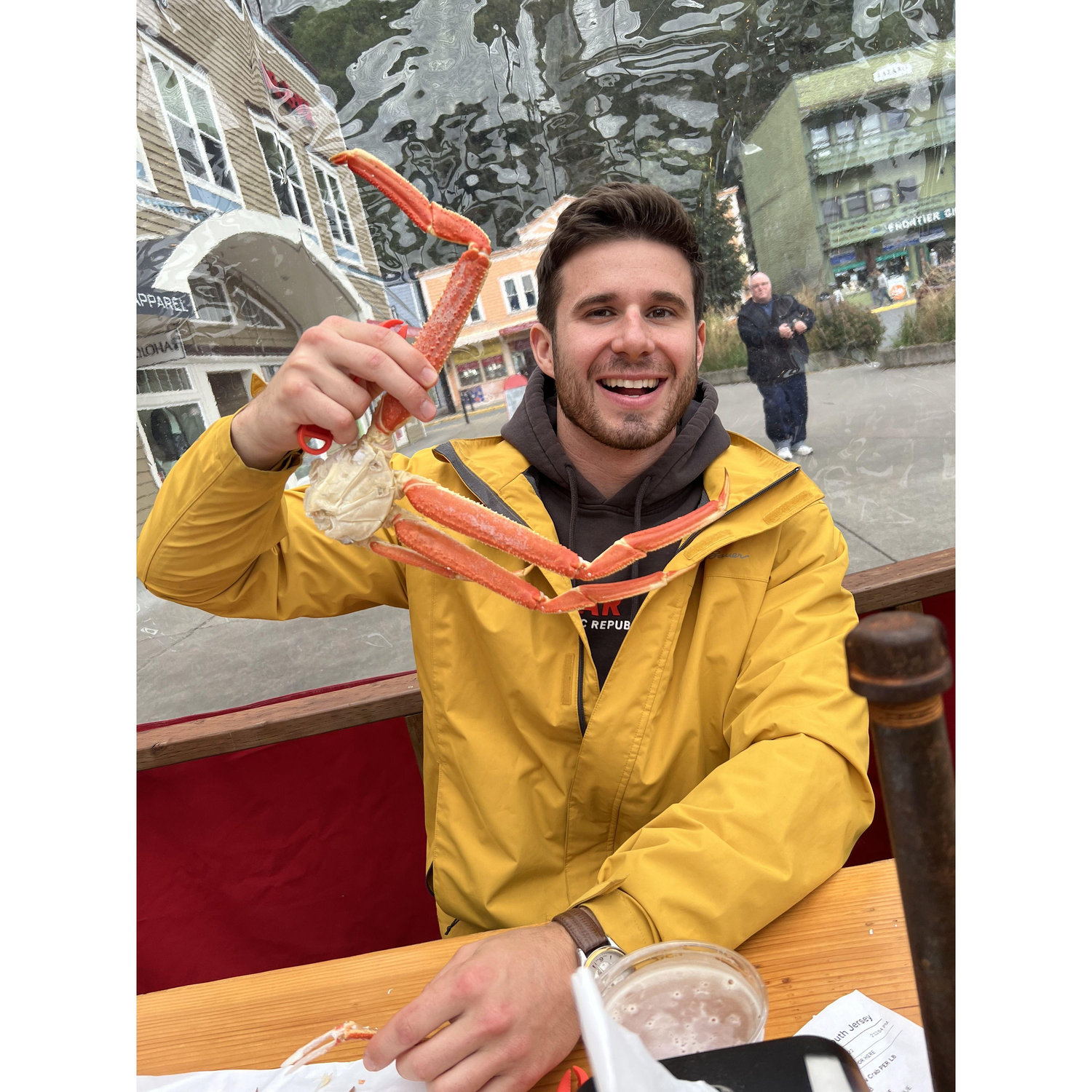 Aidan eating a huge crab in downtown Juneau during our Alaska cruise