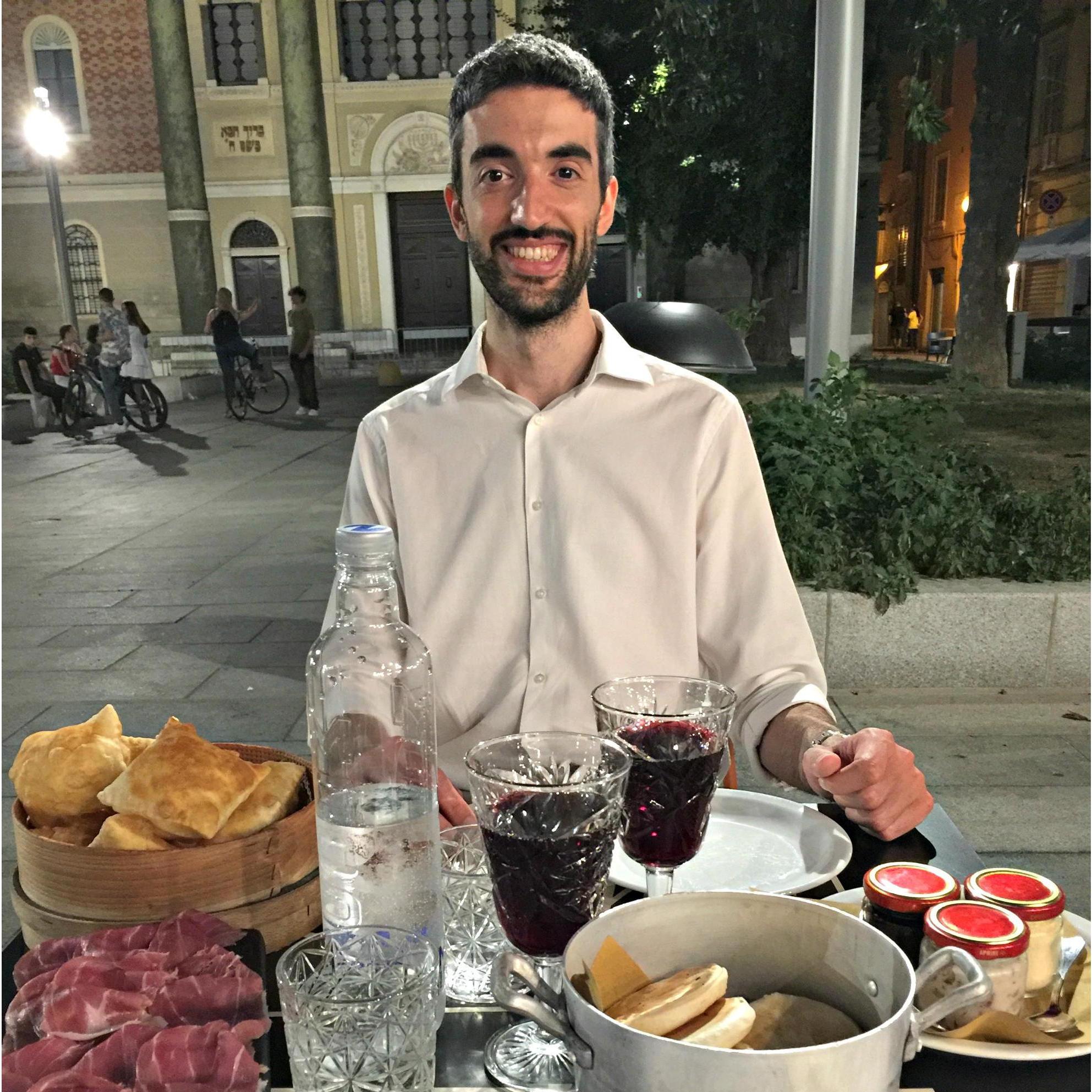 Gianluca in his element eating gnocco fritto in Modena