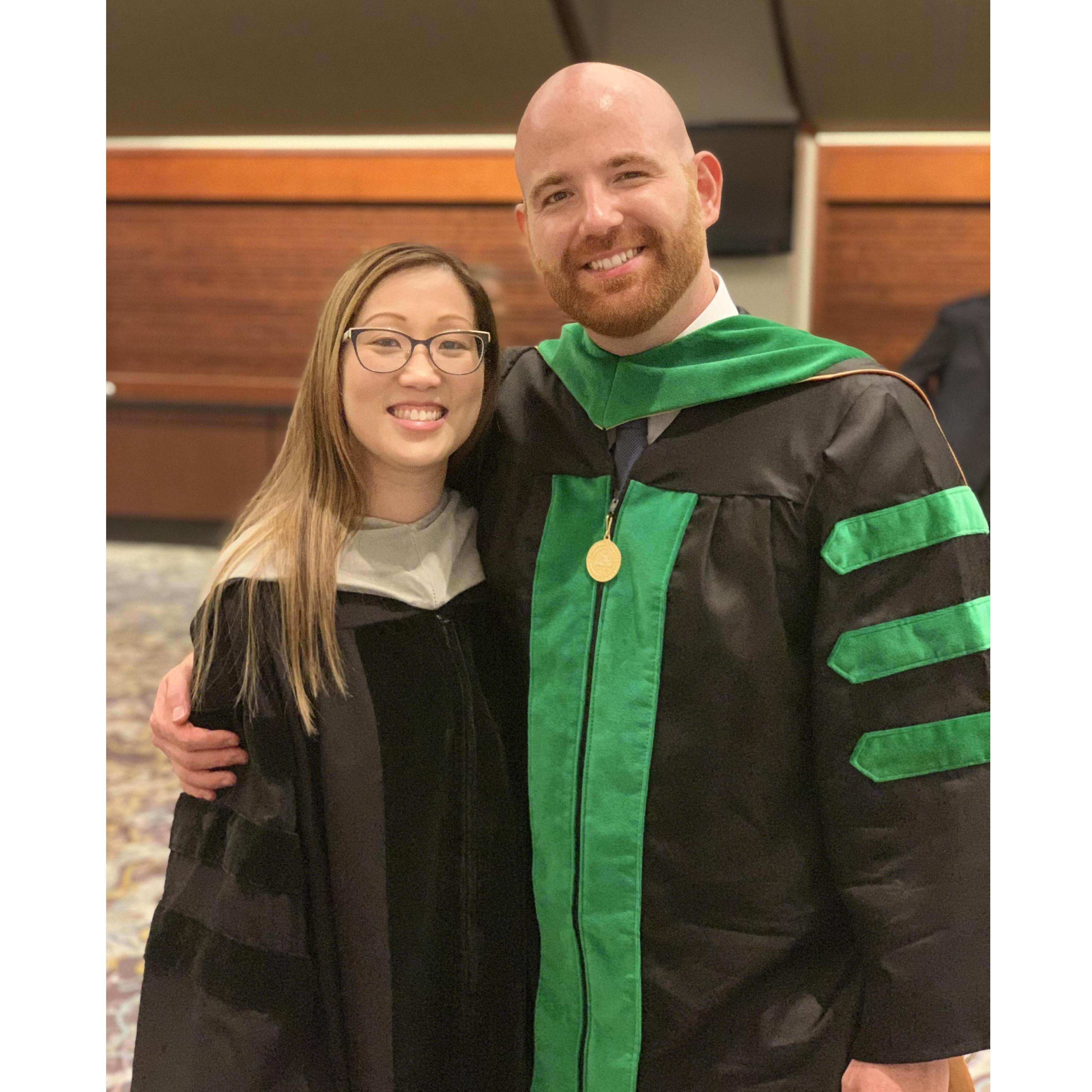 Amanda hooded Patrick at his graduation