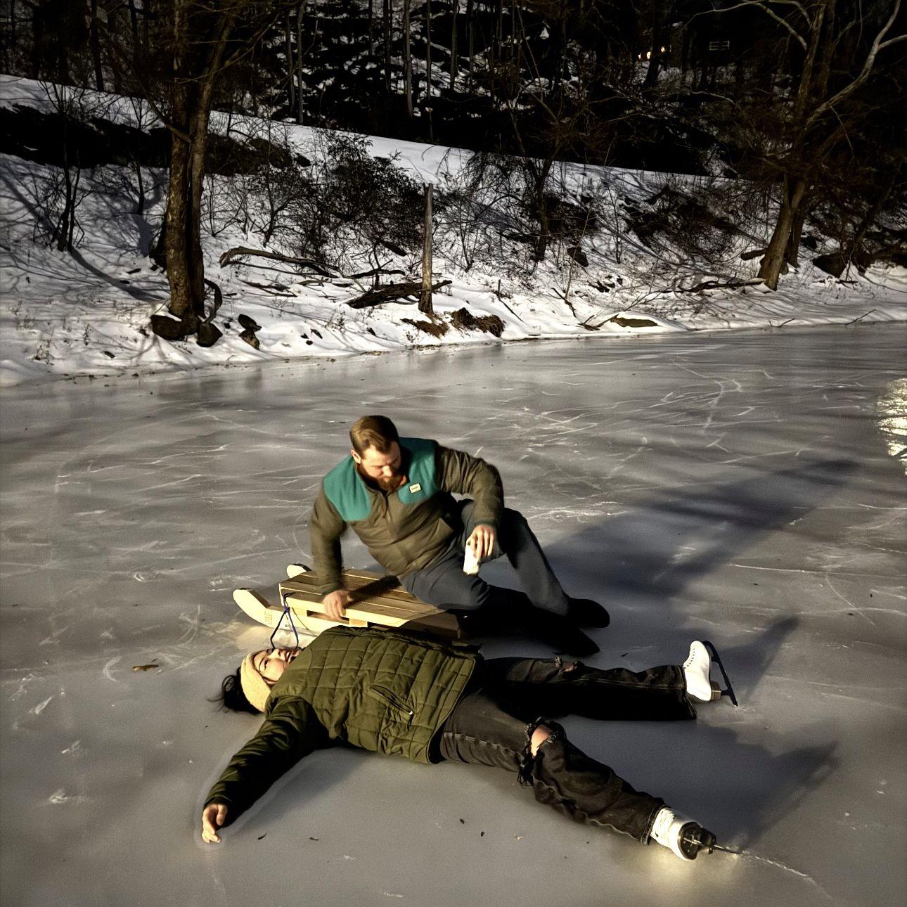 Our friends river froze over this past winter, This is Eileen wiped out after putting that sled to work on the ice haha.