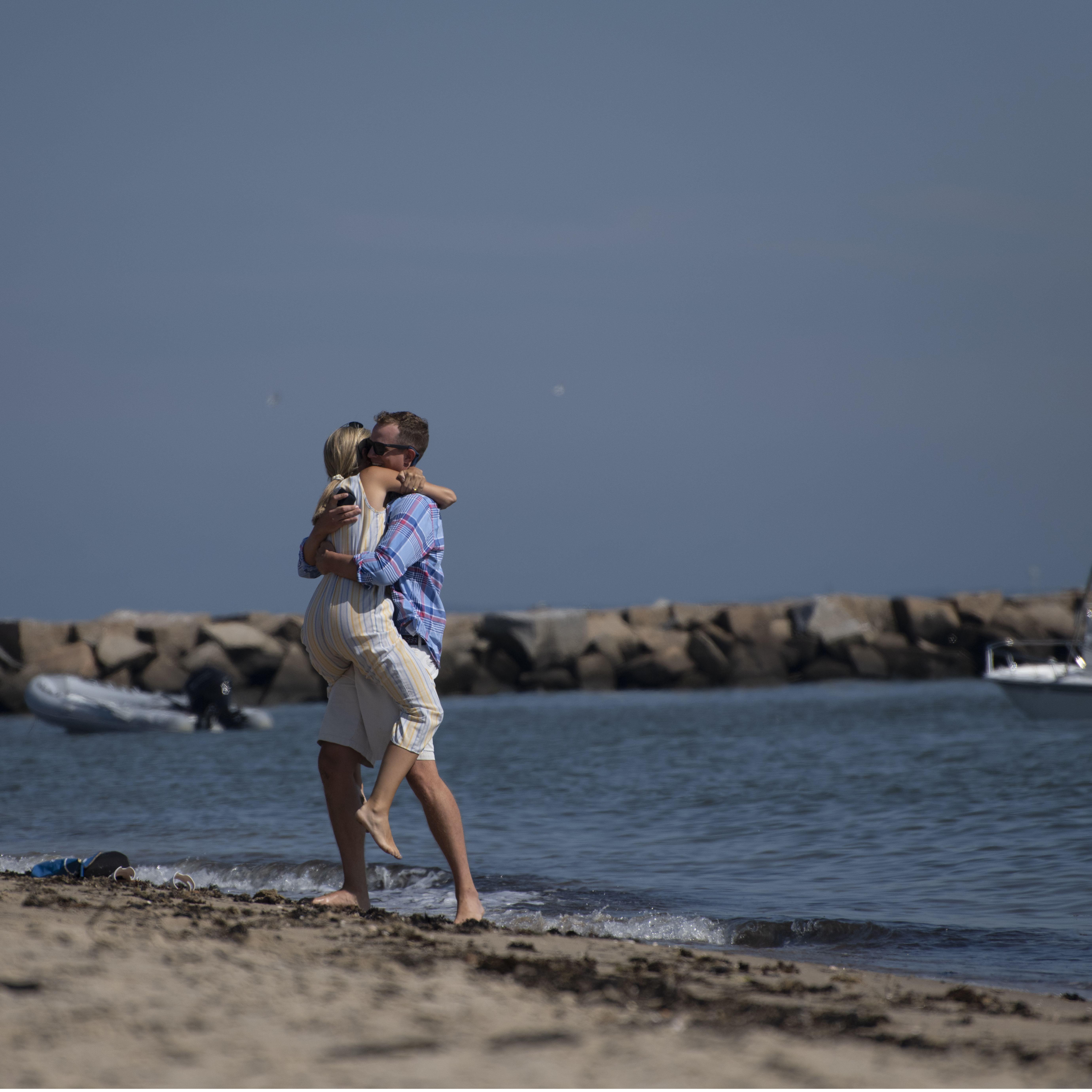 Emily saying, "YES!" and immediately jumping into Quinn's arms!