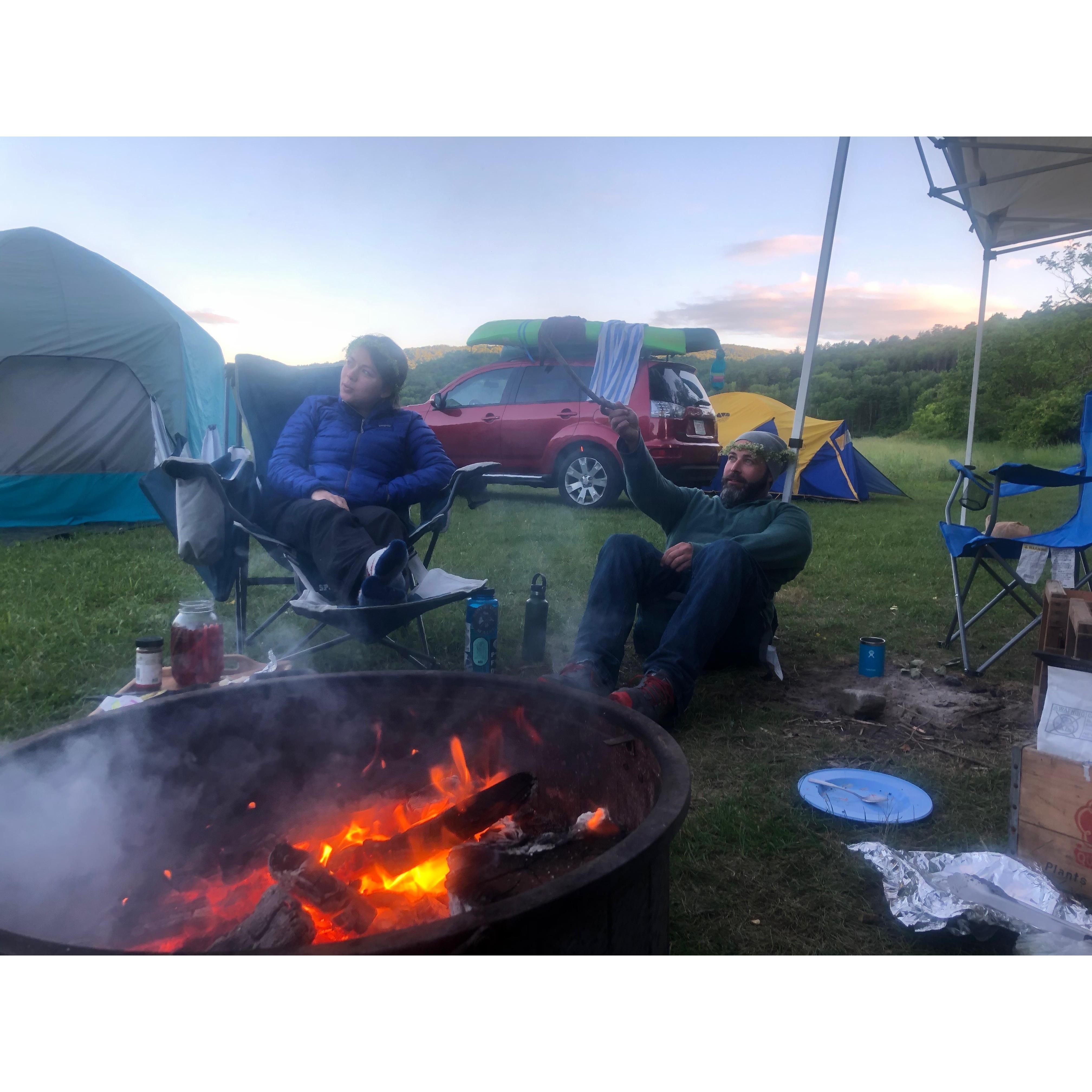 By the fire on one of our first camping trips, in Vermont.